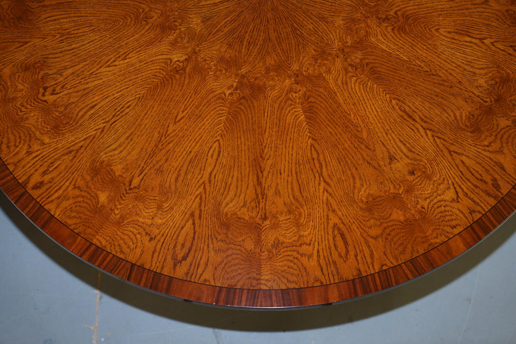 https://a.1stdibscdn.com/brand-new-cluster-oak-extending-jupe-round-dining-tables-seats-6-12-people-for-sale-picture-7/f_28233/f_189865521588878928629/DSC06041_master.JPG