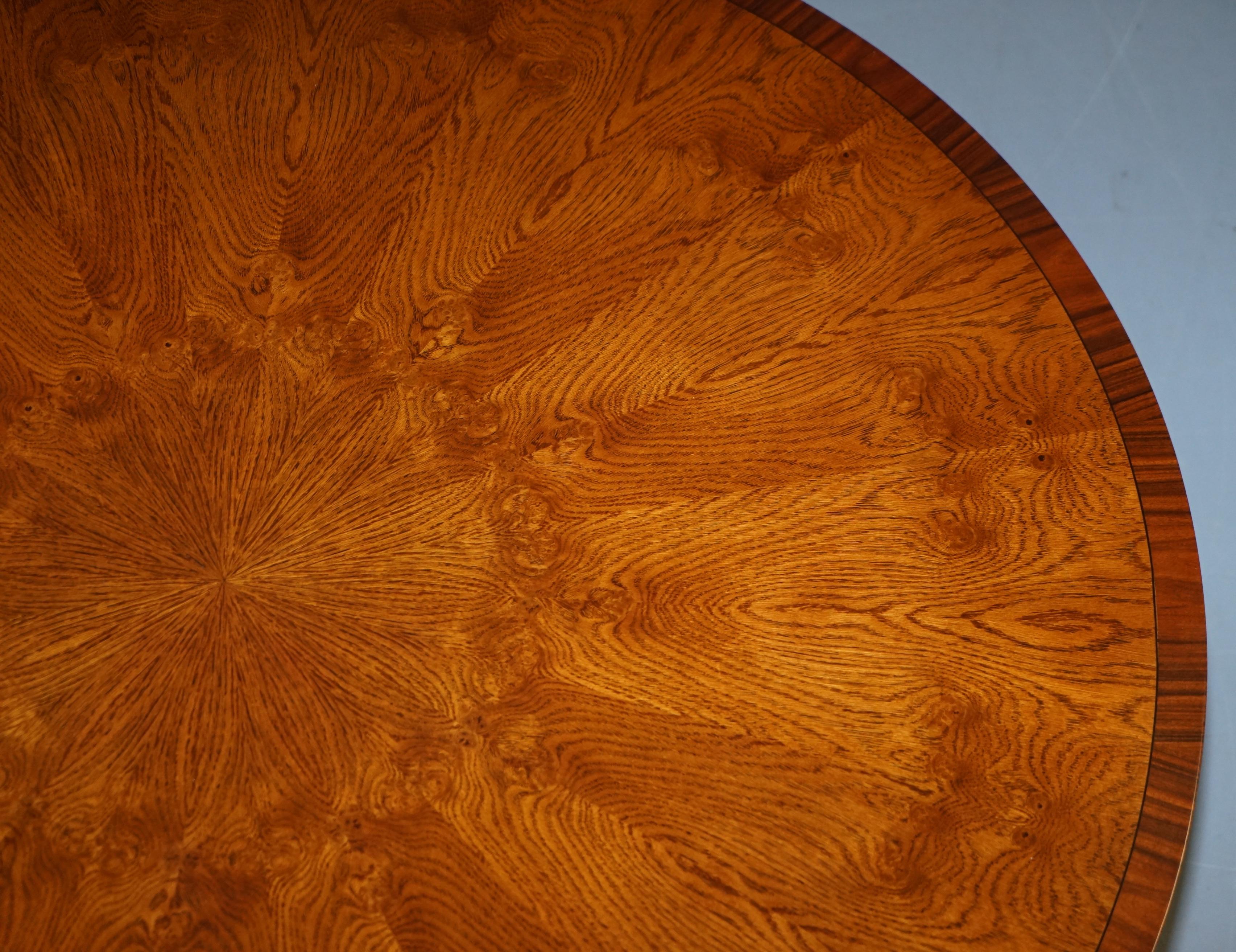 https://a.1stdibscdn.com/brand-new-cluster-oak-extending-jupe-round-dining-tables-seats-6-12-people-for-sale-picture-8/f_28233/f_189865521588878931550/DSC06042_master.JPG