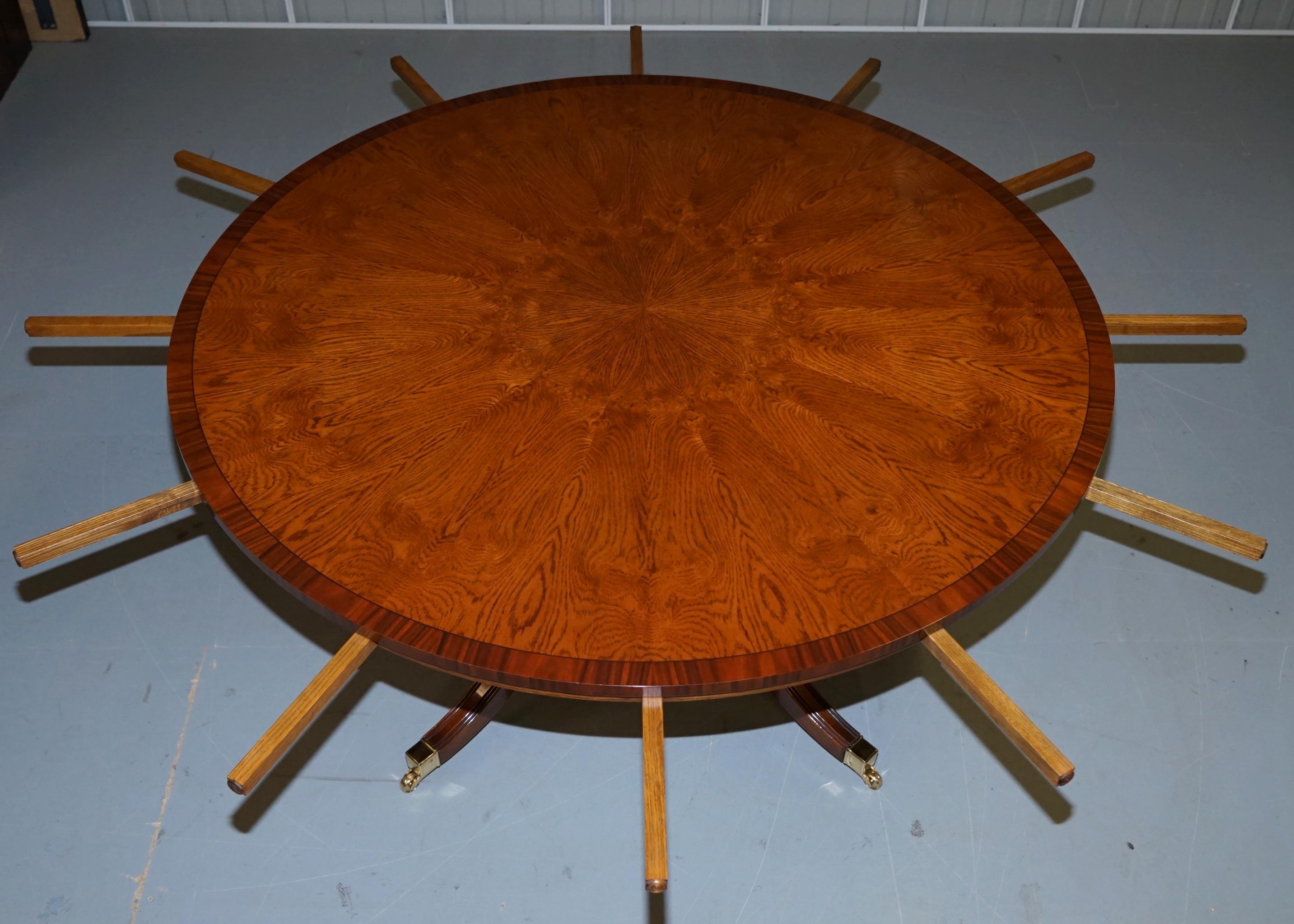 https://a.1stdibscdn.com/brand-new-cluster-oak-extending-jupe-round-dining-tables-seats-6-12-people-for-sale-picture-9/f_28233/f_189865521588878933712/DSC06051_master.JPG