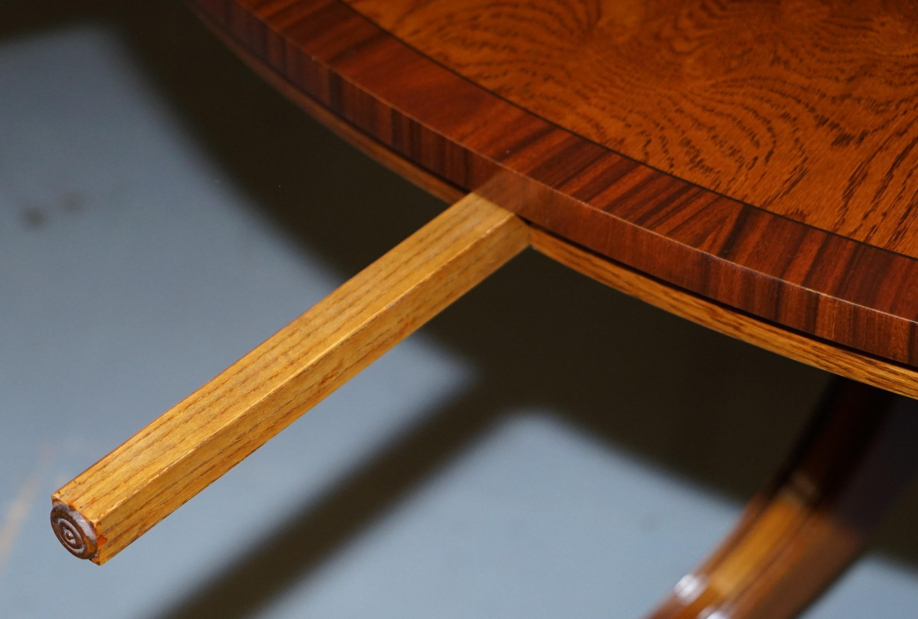 https://a.1stdibscdn.com/brand-new-cluster-oak-extending-jupe-round-dining-tables-seats-6-12-people-for-sale-picture-12/f_28233/f_189865521588878939122/DSC06055_master.JPG