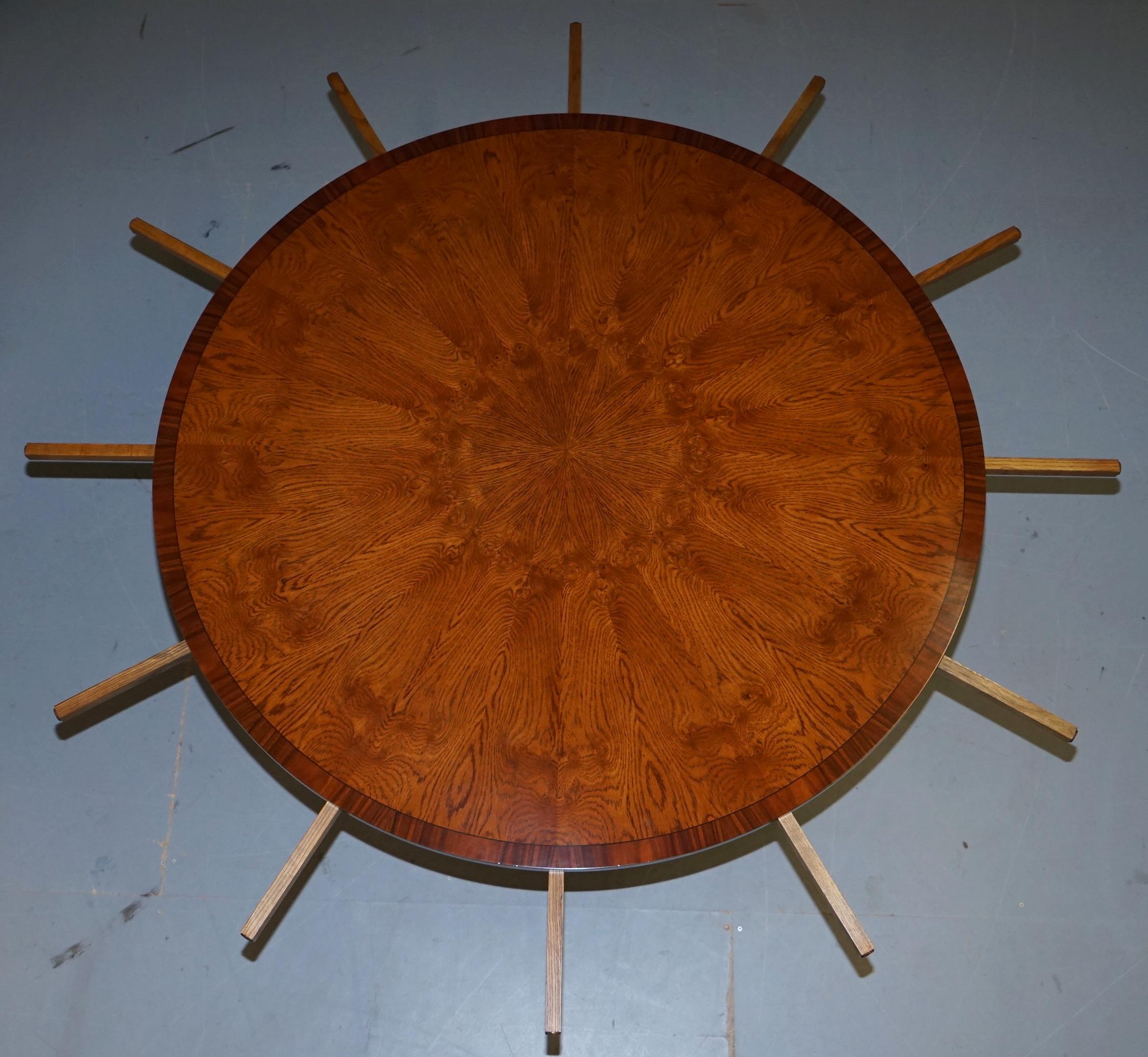 https://a.1stdibscdn.com/brand-new-cluster-oak-extending-jupe-round-dining-tables-seats-6-12-people-for-sale-picture-13/f_28233/f_189865521588878937726/DSC06056_master.JPG
