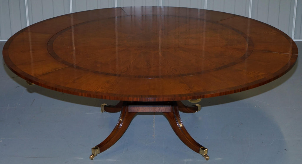 https://a.1stdibscdn.com/brand-new-cluster-oak-extending-jupe-round-dining-tables-seats-6-12-people-for-sale-picture-14/f_28233/f_189865521588878940597/DSC06062_master.JPG