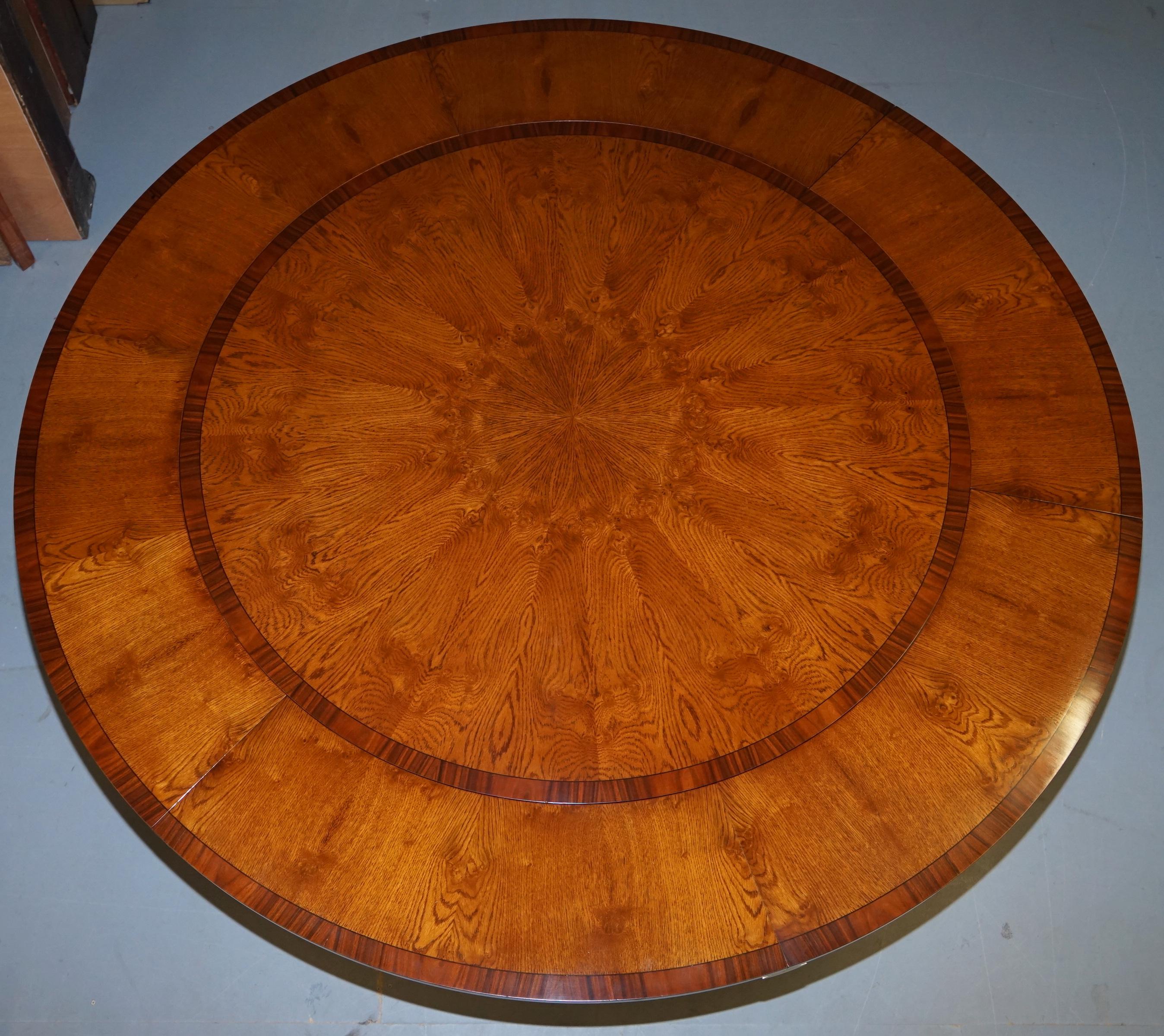https://a.1stdibscdn.com/brand-new-cluster-oak-extending-jupe-round-dining-tables-seats-6-12-people-for-sale-picture-17/f_28233/f_189865521588878944678/DSC06074_master.JPG