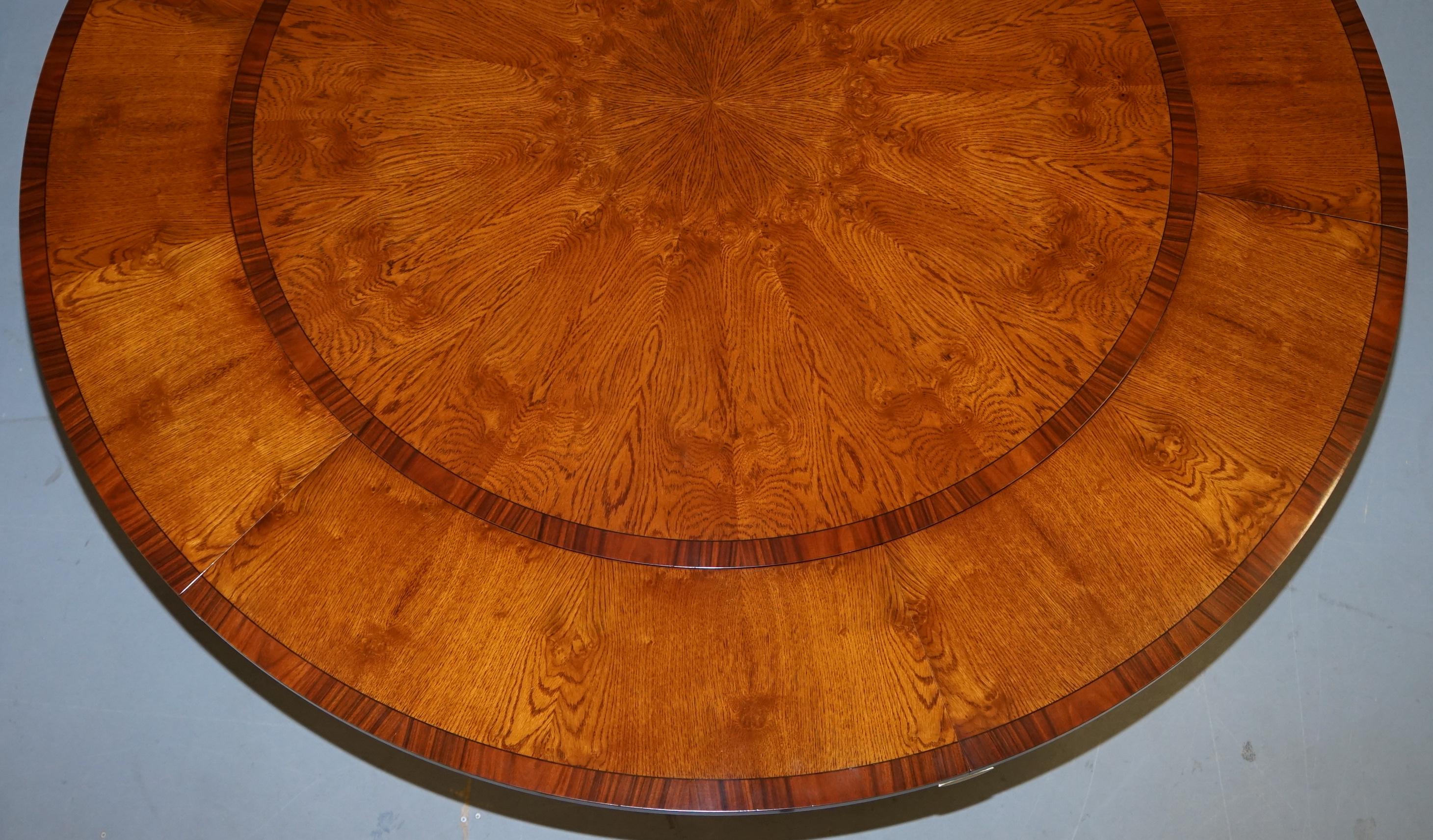 https://a.1stdibscdn.com/brand-new-cluster-oak-extending-jupe-round-dining-tables-seats-6-12-people-for-sale-picture-18/f_28233/f_189865521588878946586/DSC06077_master.JPG