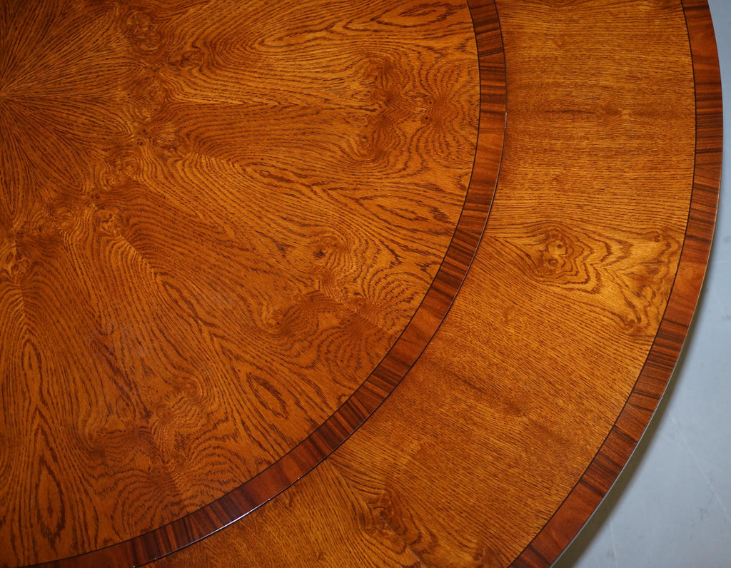 https://a.1stdibscdn.com/brand-new-cluster-oak-extending-jupe-round-dining-tables-seats-6-12-people-for-sale-picture-19/f_28233/f_189865521588878949028/DSC06080_master.JPG