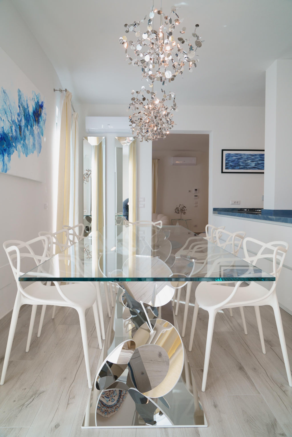 https://a.1stdibscdn.com/dining-table-tempered-glass-top-stainless-steel-mirror-finish-base-collectible-for-sale-picture-6/f_22003/f_302743721662362169223/DSC08216_master.jpg