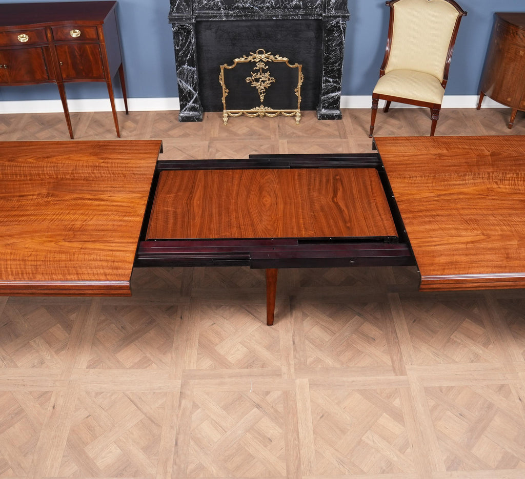 https://a.1stdibscdn.com/theodore-alexander-dorchester-dining-table-for-sale-picture-13/f_85472/f_490094221772208760372/DSC08971_master.jpg