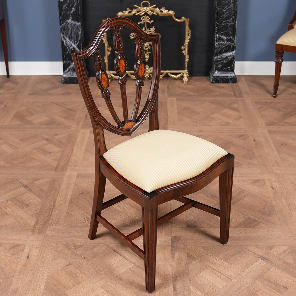 https://a.1stdibscdn.com/set-of-10-inlaid-shield-back-chairs-for-sale-picture-12/f_85472/f_444286421744129582334/DSC09284_master.jpg