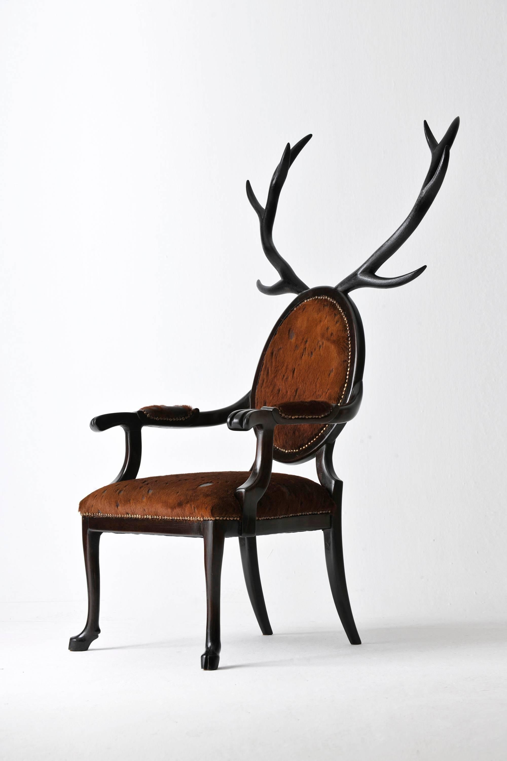 https://a.1stdibscdn.com/21st-century-hybrid-no-1-armchair-with-hand-carved-antlers-and-brown-leather-for-sale-picture-2/f_36601/1525158607518/_DSC153k_master.jpg