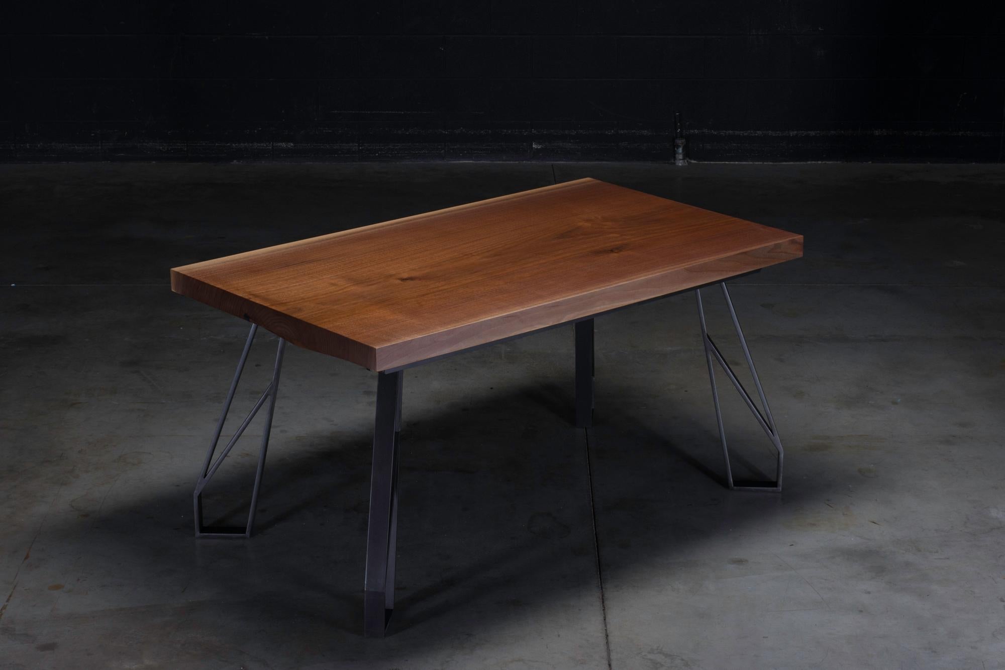 https://a.1stdibscdn.com/walnut-expanding-dining-table-with-black-steel-legs-chalmers-dining-table-for-sale-picture-10/f_47361/1562859371877/_DSC7841_master.jpg