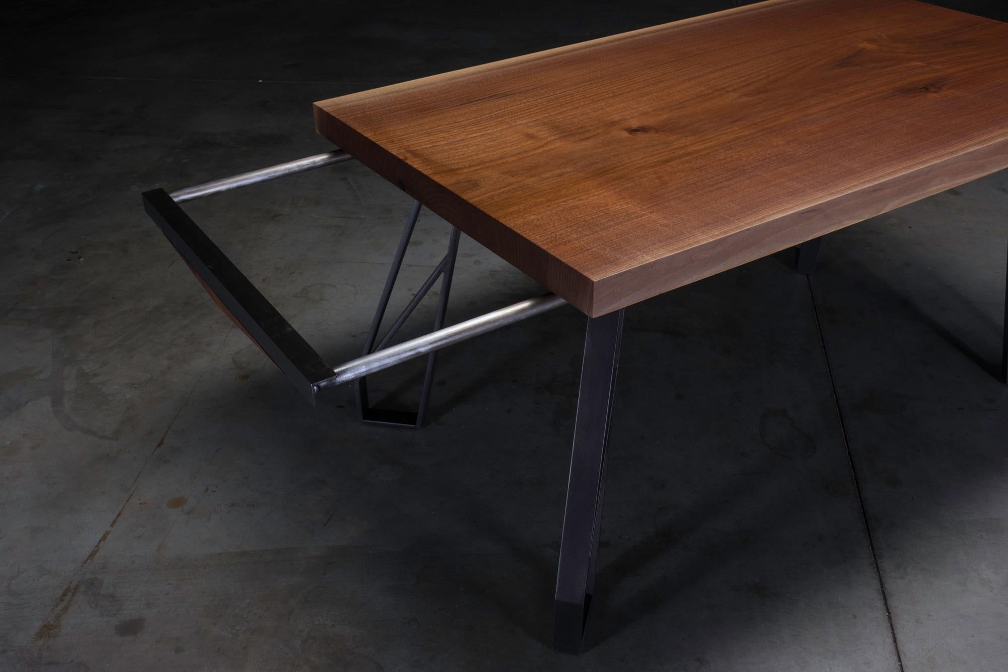 https://a.1stdibscdn.com/walnut-expanding-dining-table-with-black-steel-legs-chalmers-dining-table-for-sale-picture-9/f_47361/1562859370397/_DSC7843_master.jpg
