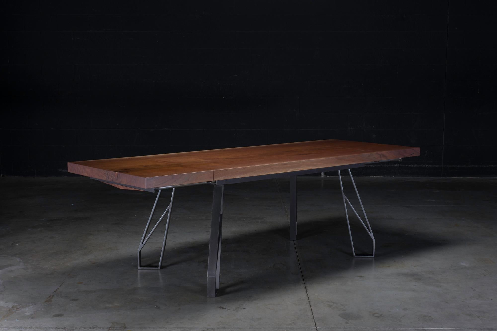 https://a.1stdibscdn.com/walnut-expanding-dining-table-with-black-steel-legs-chalmers-dining-table-for-sale-picture-8/f_47361/1562859369229/_DSC7851_master.jpg