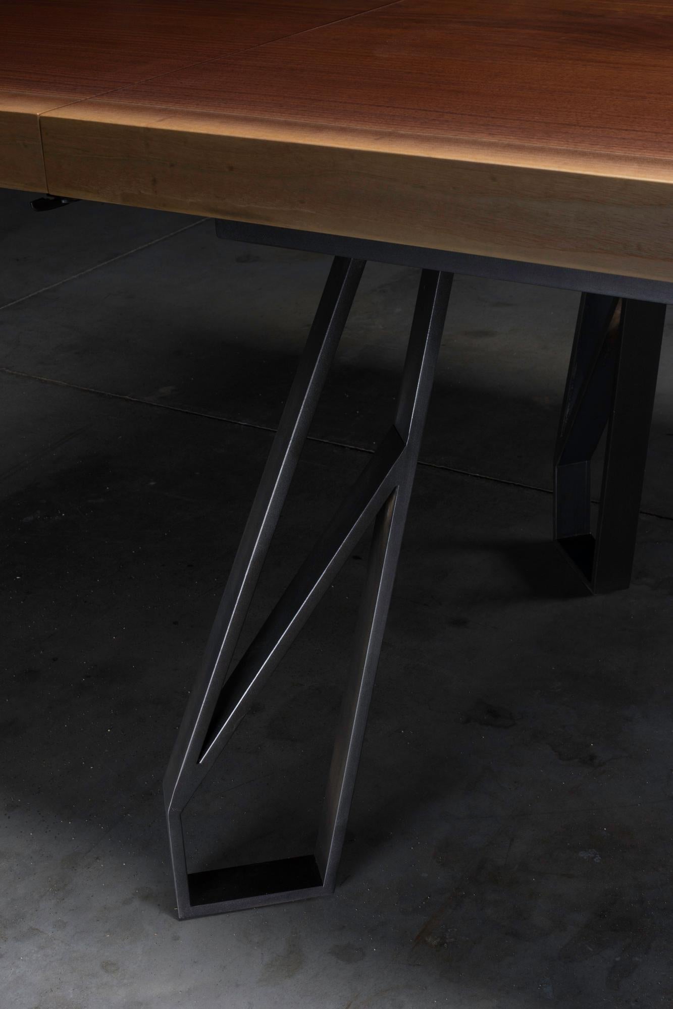 https://a.1stdibscdn.com/walnut-expanding-dining-table-with-black-steel-legs-chalmers-dining-table-for-sale-picture-4/f_47361/1562859364370/_DSC7889_master.jpg