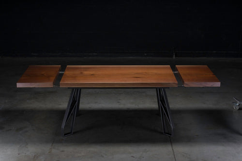 https://a.1stdibscdn.com/walnut-expanding-dining-table-with-black-steel-legs-chalmers-dining-table-for-sale-picture-2/f_47361/1562859361573/_DSC7914_master.jpg
