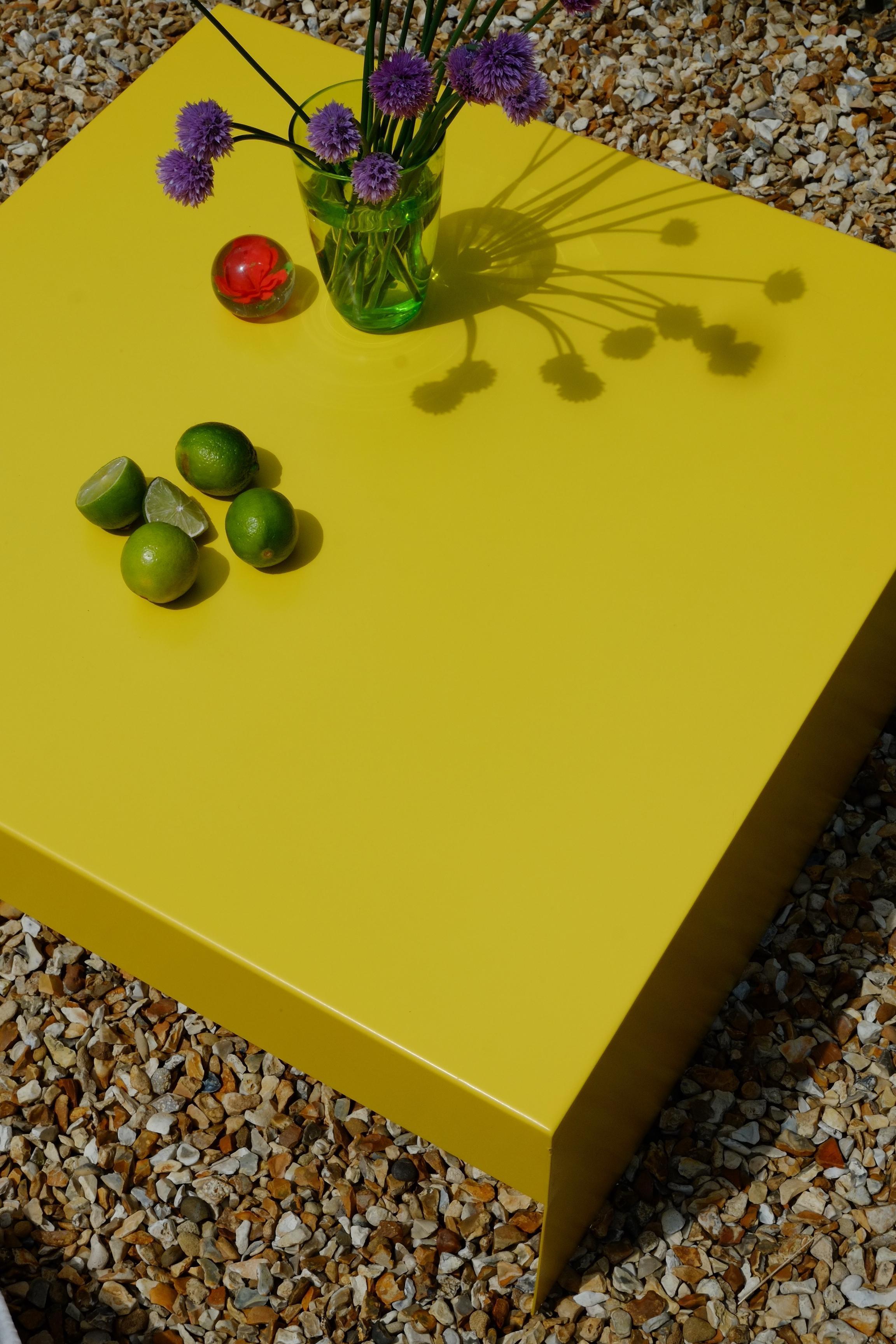 https://a.1stdibscdn.com/matt-yellow-single-form-square-aluminium-coffee-table-indoor-outdoor-for-sale-picture-3/f_28943/f_482985121768303563602/DSCF0455_1653661748024_master.JPG
