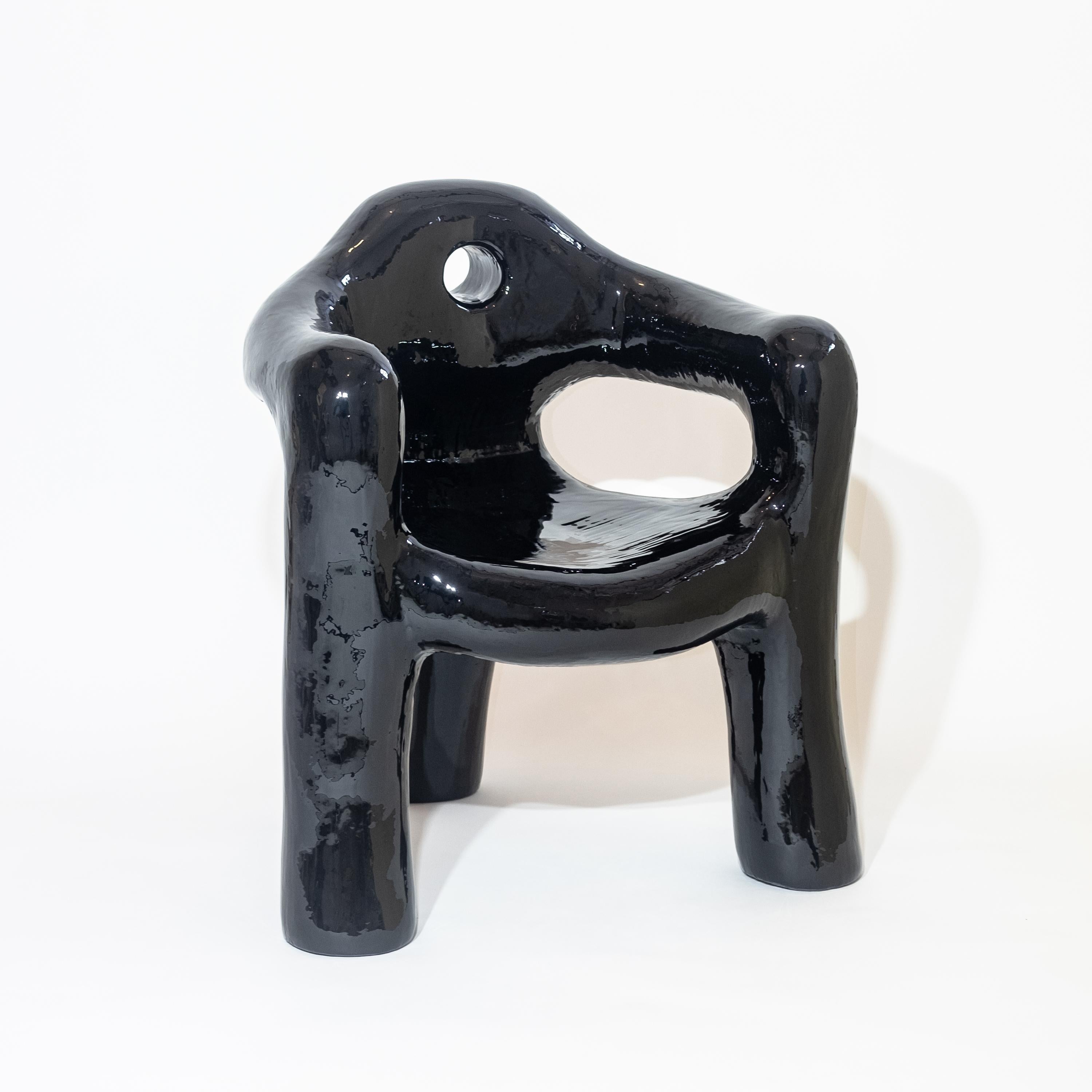 https://a.1stdibscdn.com/black-sculptural-three-legged-armchair-in-resin-covered-foam-by-michal-cihlar-for-sale-picture-3/f_37133/f_259463521635864322122/DSCF5787_master.jpg