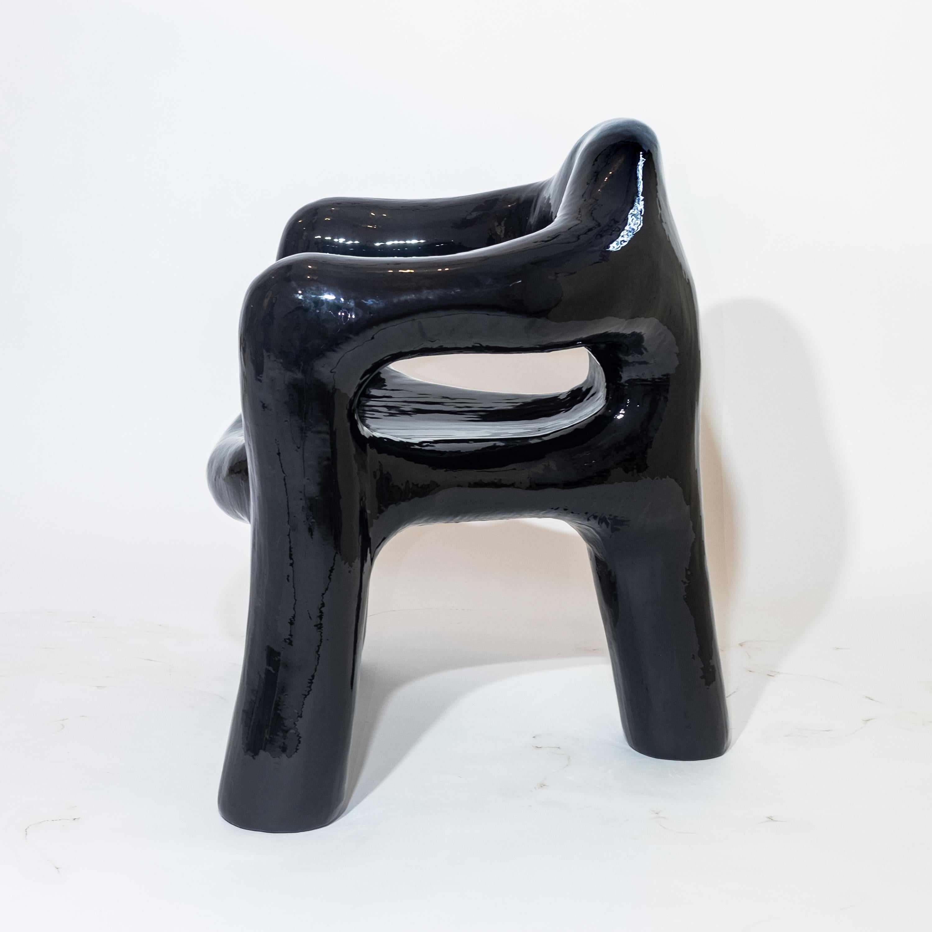 https://a.1stdibscdn.com/black-sculptural-three-legged-armchair-in-resin-covered-foam-by-michal-cihlar-for-sale-picture-5/f_37133/f_259463521635864322293/DSCF5856_master.jpg