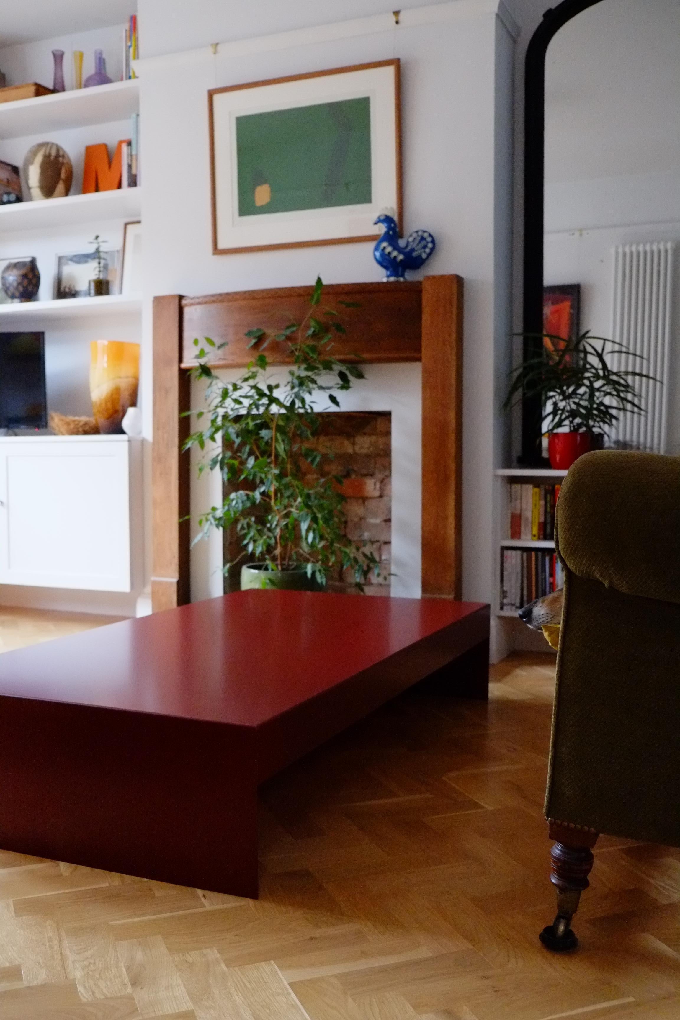 https://a.1stdibscdn.com/large-low-burgundy-single-form-coffee-sofa-table-customisable-for-sale-picture-5/f_28943/f_48386212/DSCF9672_1768828445056_master.JPG
