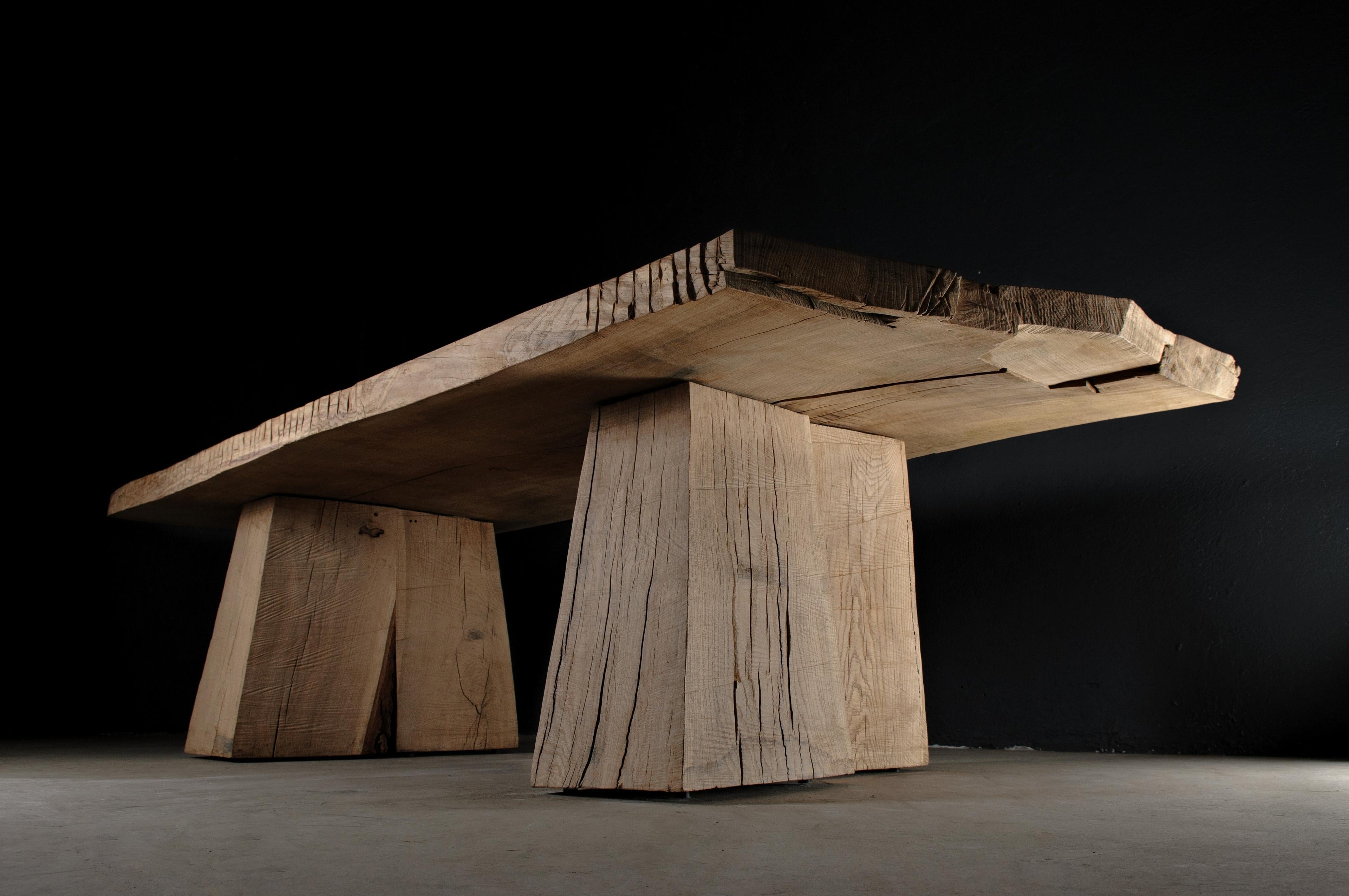 https://a.1stdibscdn.com/sculpted-massive-dining-table-v8-in-solid-oakwood-custom-size-for-sale-picture-2/f_31233/f_298323621659452601517/DSC_0001_master.jpg