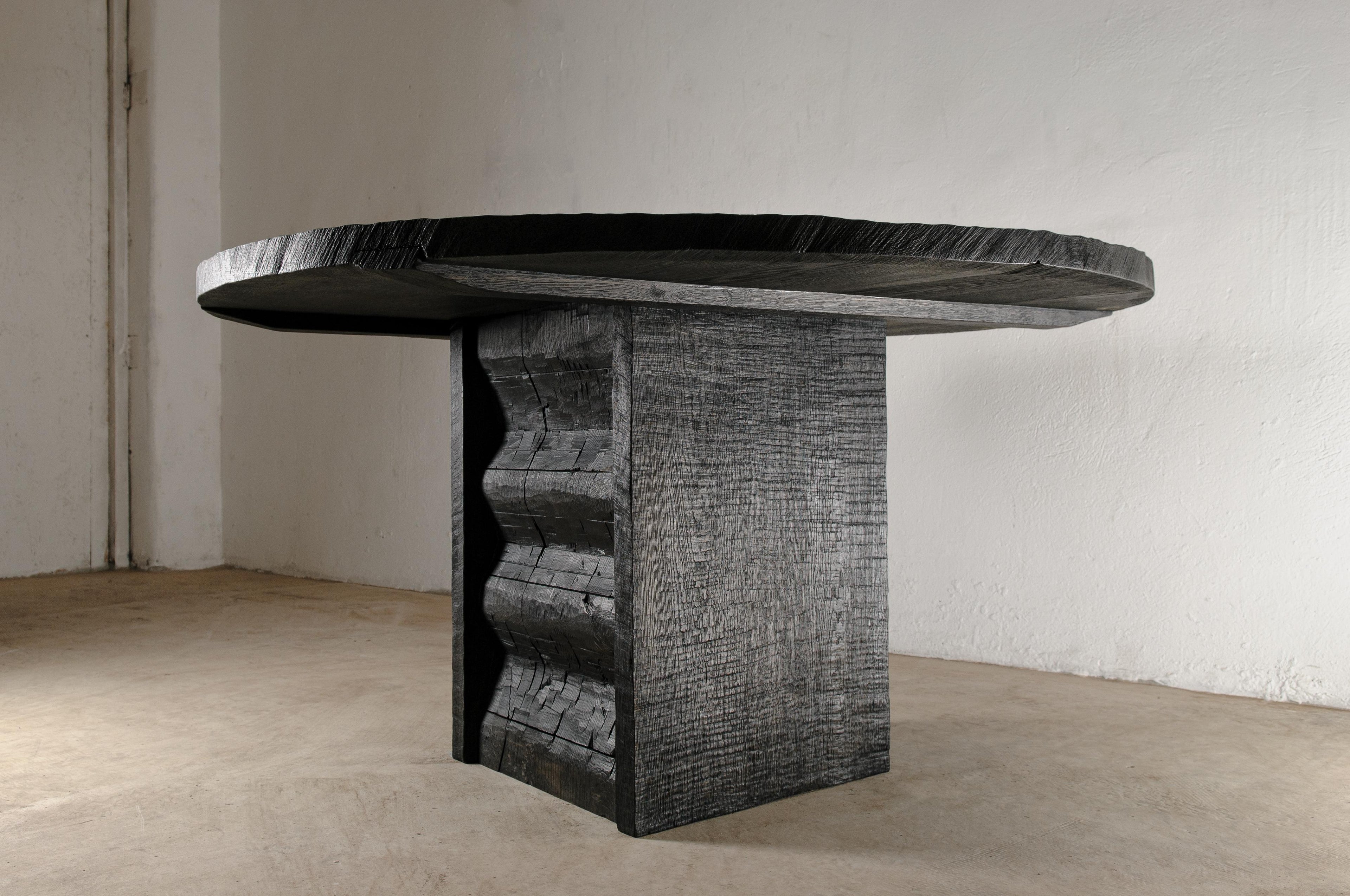 https://a.1stdibscdn.com/contemporary-carved-round-table-in-solid-oakwood-black-custom-size-m-for-sale-picture-2/f_31233/f_301956621661854367193/DSC_0001_master.jpg