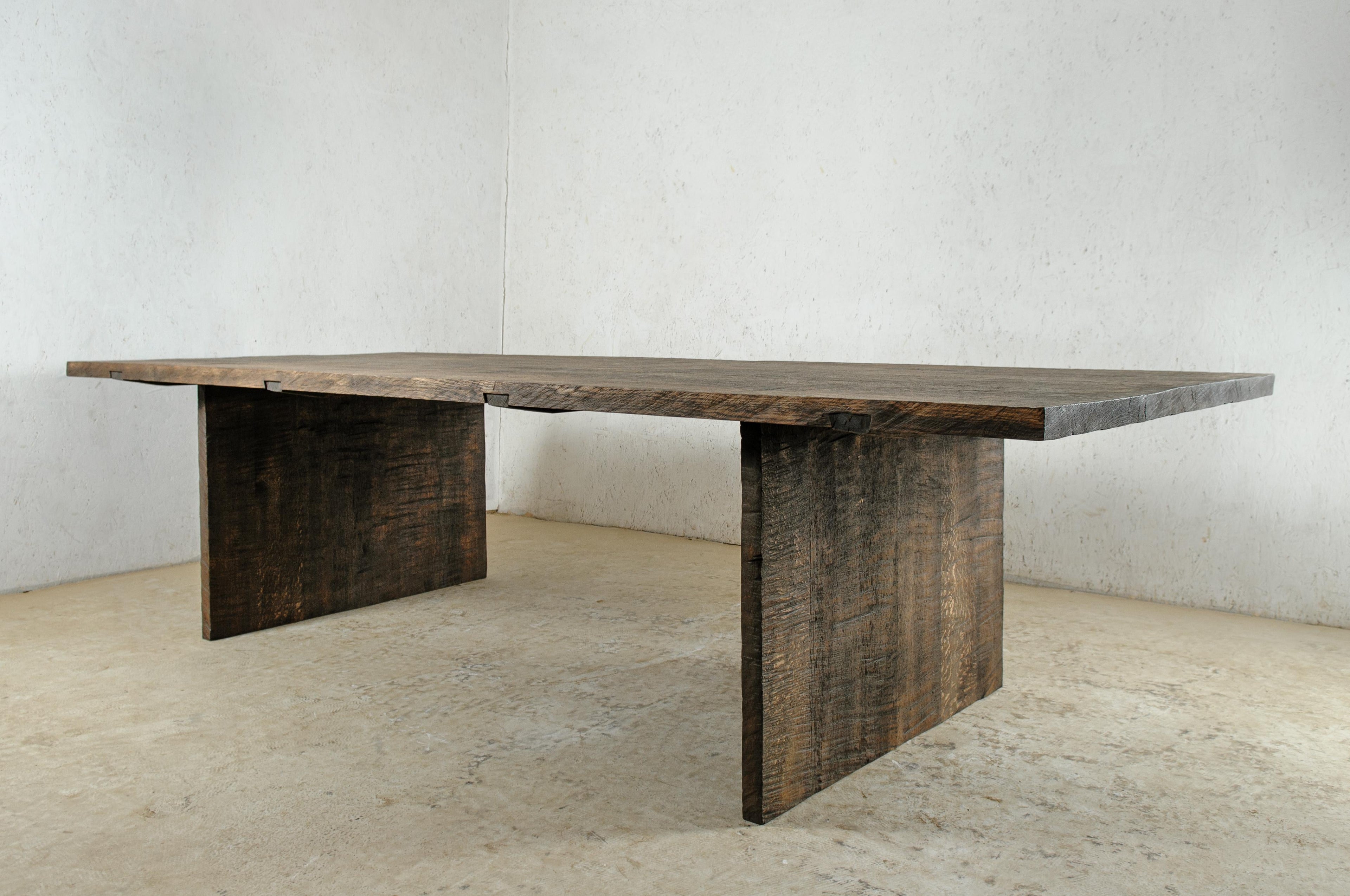 https://a.1stdibscdn.com/sculpted-dining-table-simple-dark-in-solid-oakwood-custom-size-m-for-sale-picture-3/f_31233/f_257806721634736136865/DSC_0002_master.jpg