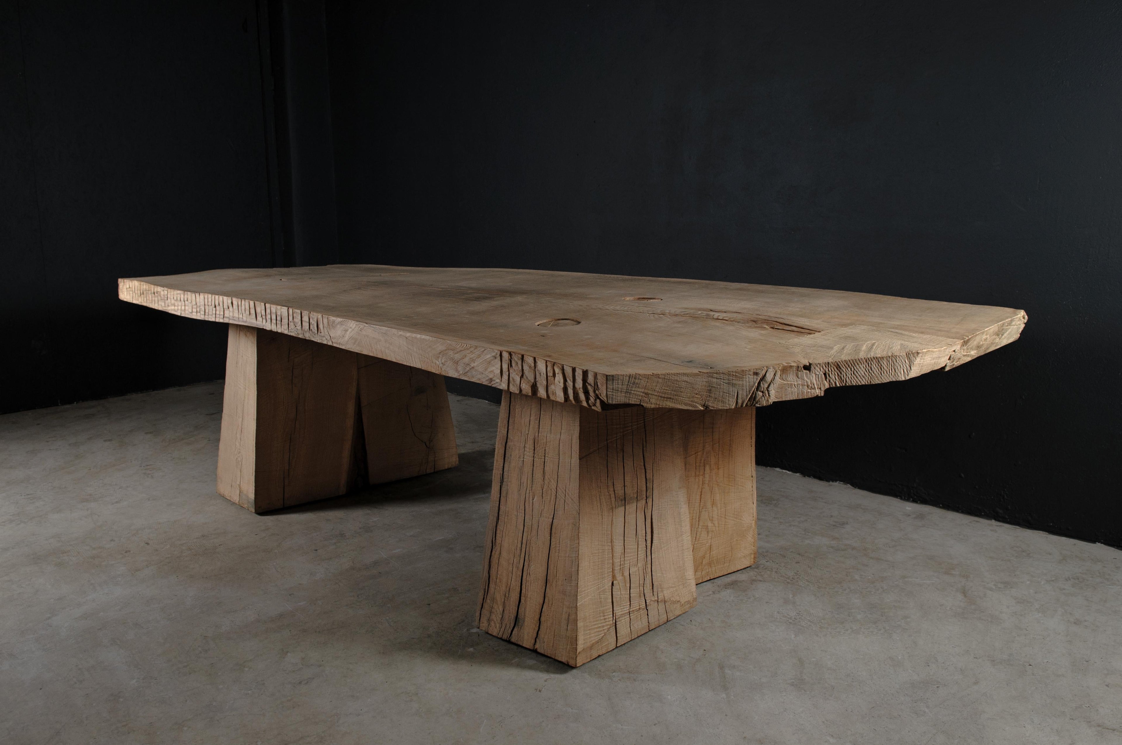 https://a.1stdibscdn.com/sculpted-massive-dining-table-v8-in-solid-oakwood-custom-size-for-sale-picture-4/f_31233/f_298323621659452601918/DSC_0003_master.jpg