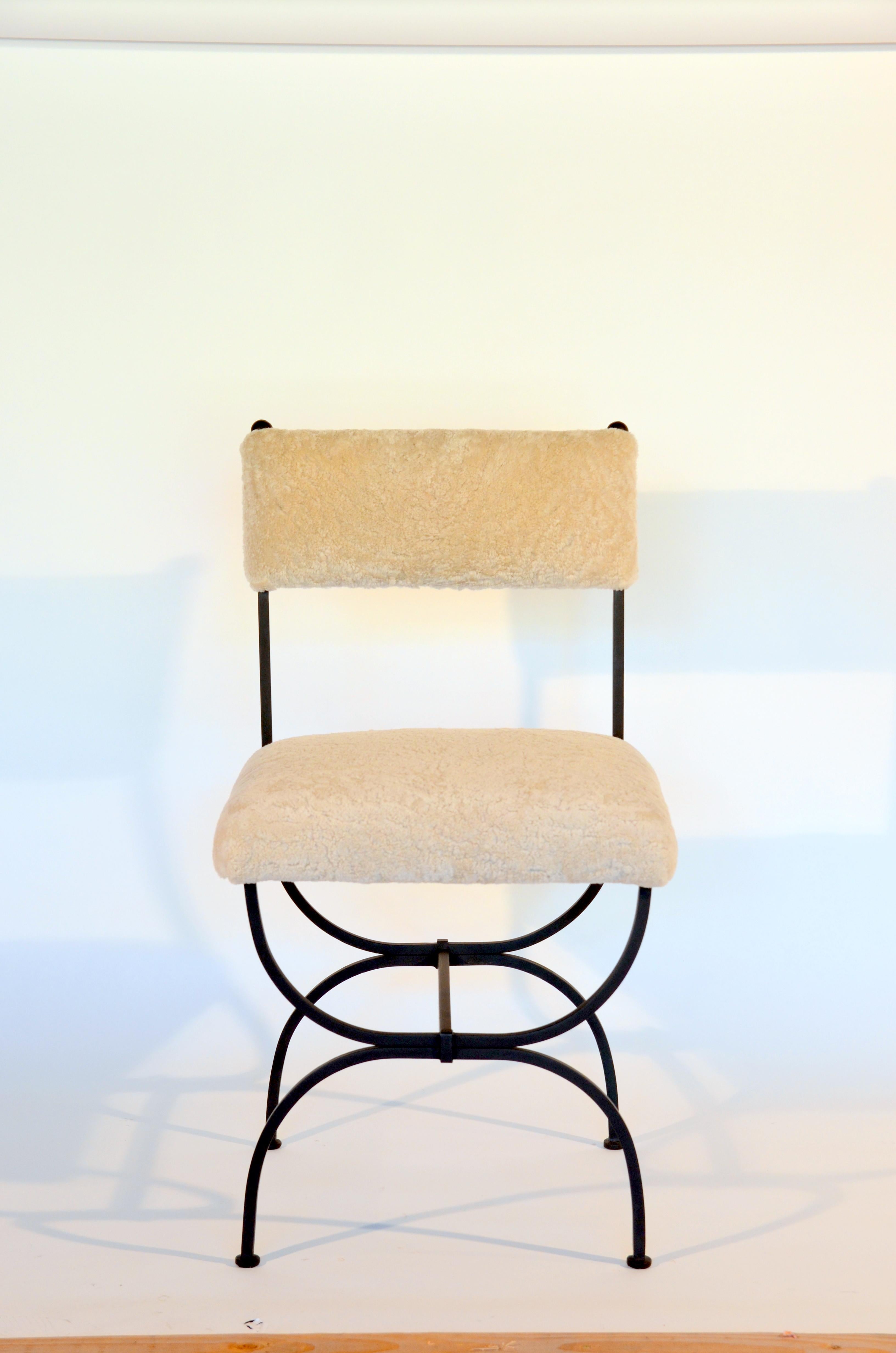 https://a.1stdibscdn.com/pair-of-chic-arcade-wrought-iron-and-shearling-chairs-by-design-freres-for-sale-picture-3/f_8184/f_222186221611307553083/DSC_0006_master.JPG