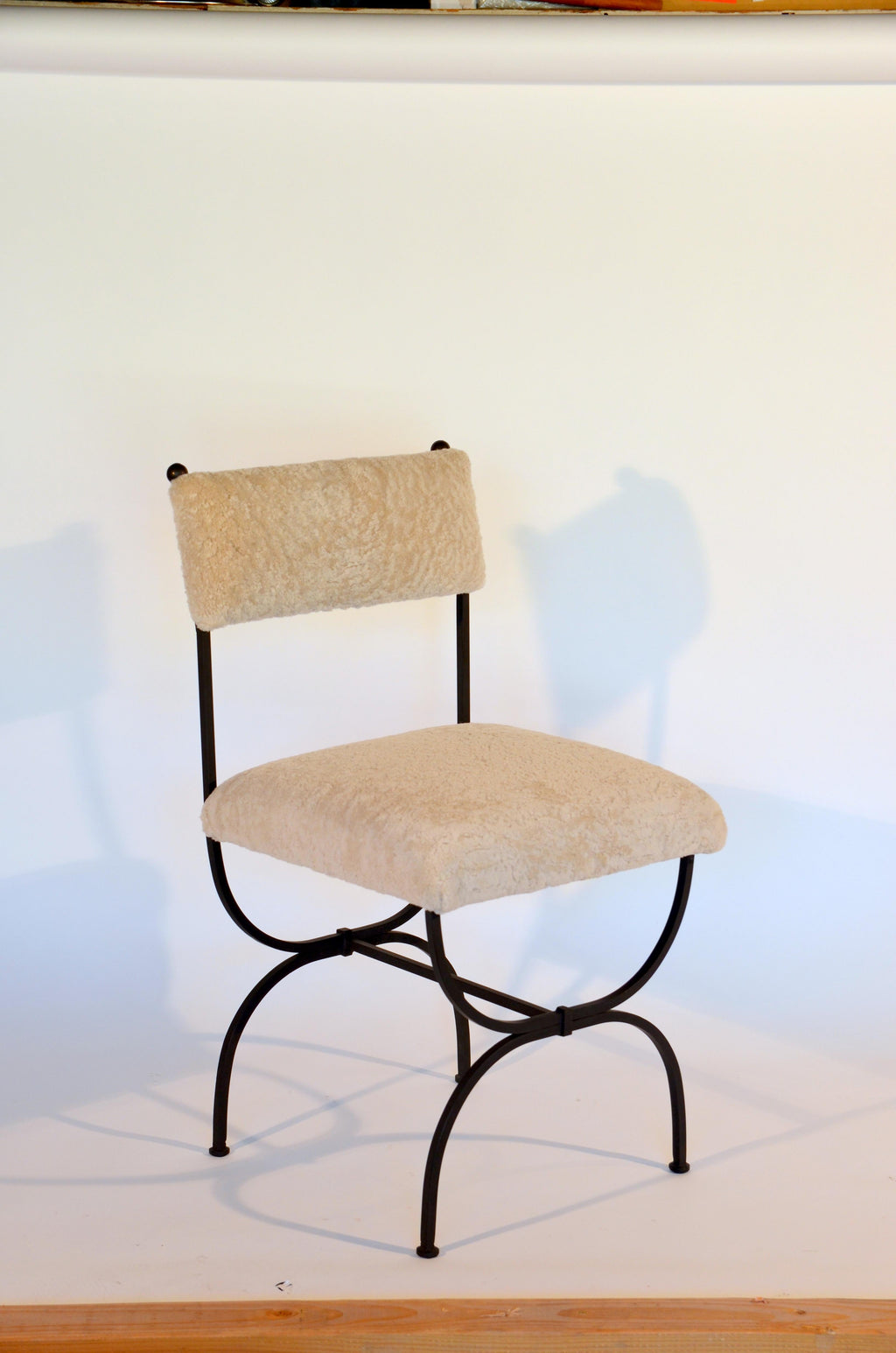 https://a.1stdibscdn.com/pair-of-chic-arcade-wrought-iron-and-shearling-chairs-by-design-freres-for-sale-picture-4/f_8184/f_222186221611307553521/DSC_0007_master.JPG