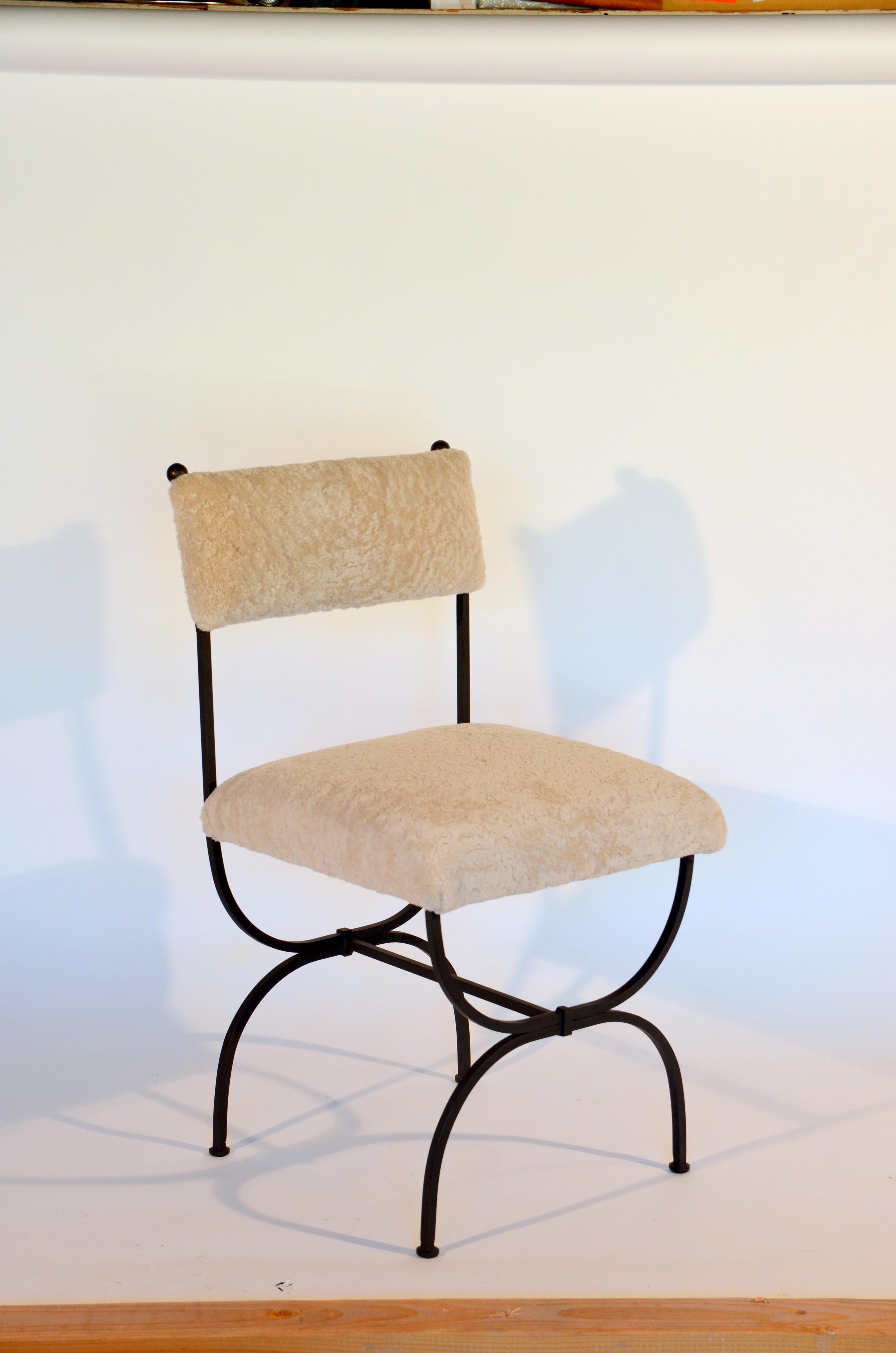 https://a.1stdibscdn.com/pair-of-chic-arcade-wrought-iron-and-shearling-chairs-by-design-freres-for-sale-picture-4/f_8184/f_222186221611307553521/DSC_0007_master.JPG