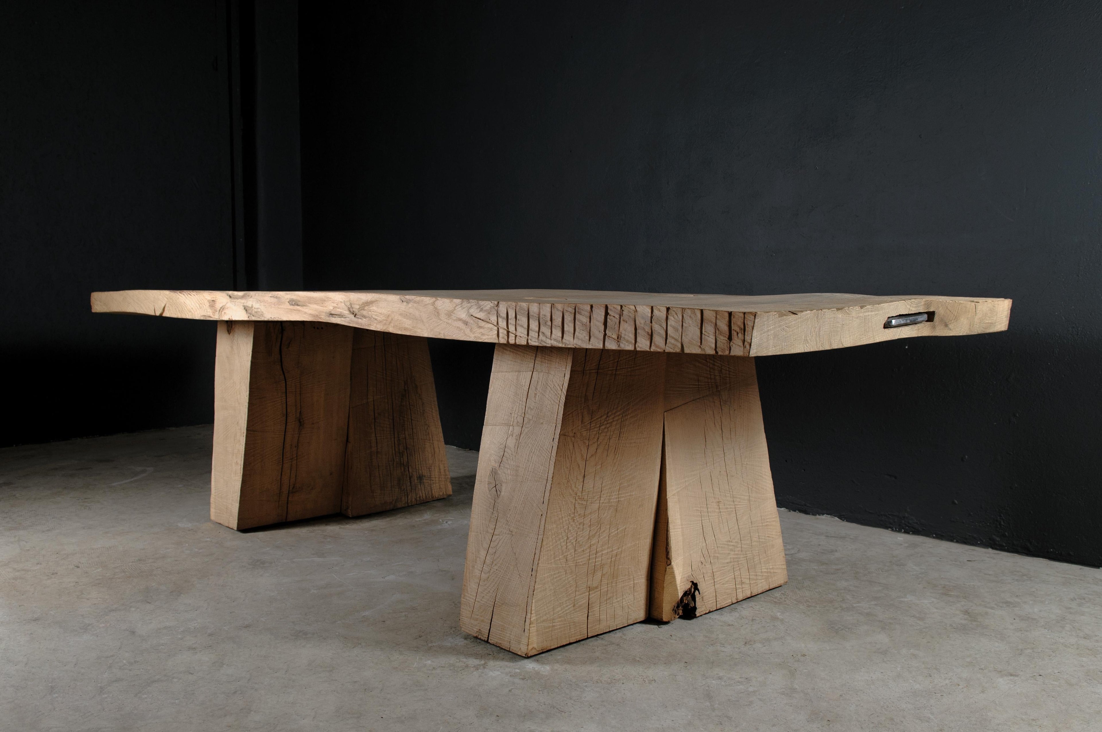 https://a.1stdibscdn.com/sculpted-massive-dining-table-v8-in-solid-oakwood-custom-size-for-sale-picture-10/f_31233/f_298323621659452605082/DSC_0009_master.jpg