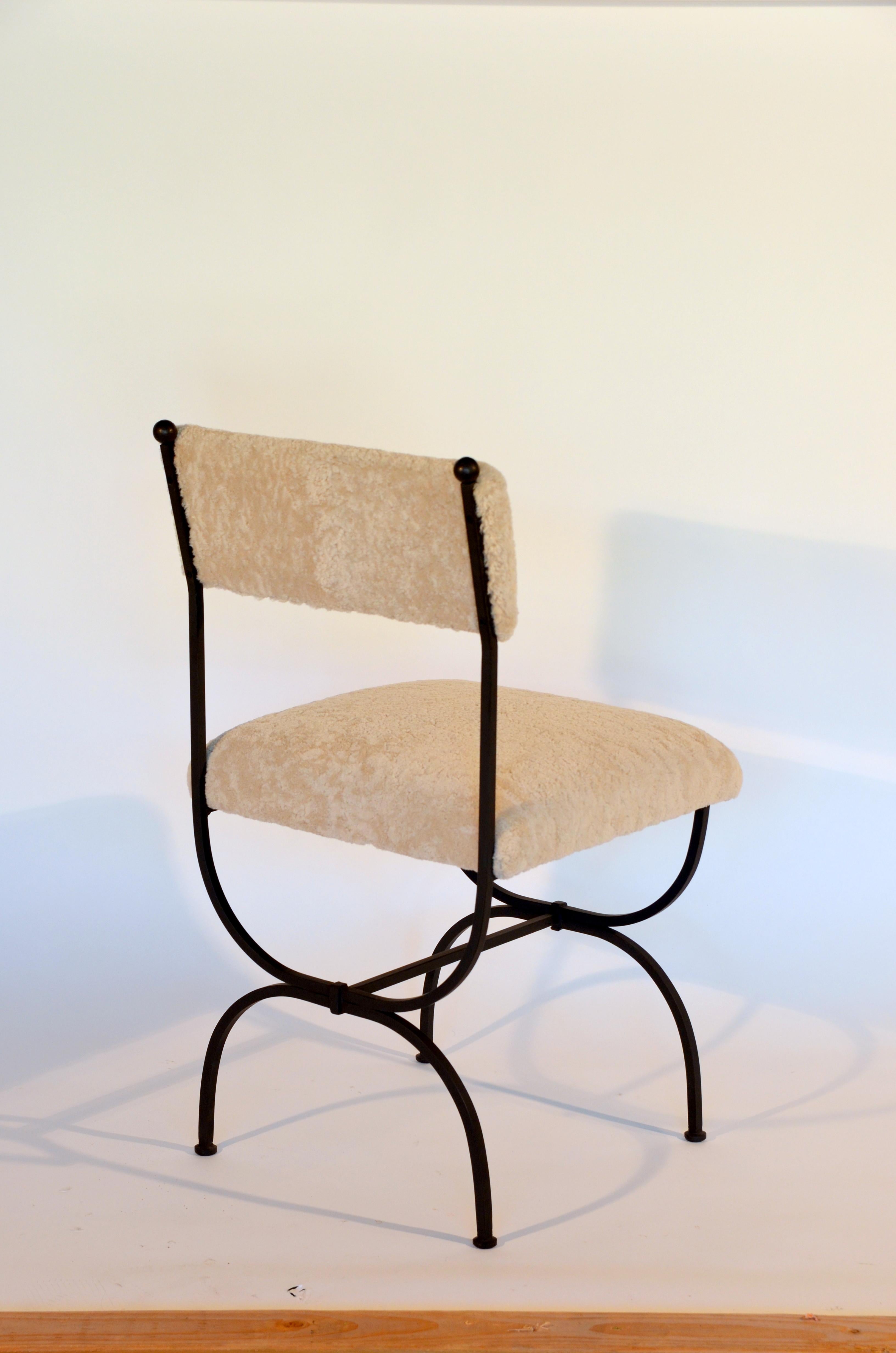 https://a.1stdibscdn.com/pair-of-chic-arcade-wrought-iron-and-shearling-chairs-by-design-freres-for-sale-picture-6/f_8184/f_222186221611307554426/DSC_0009_master.JPG