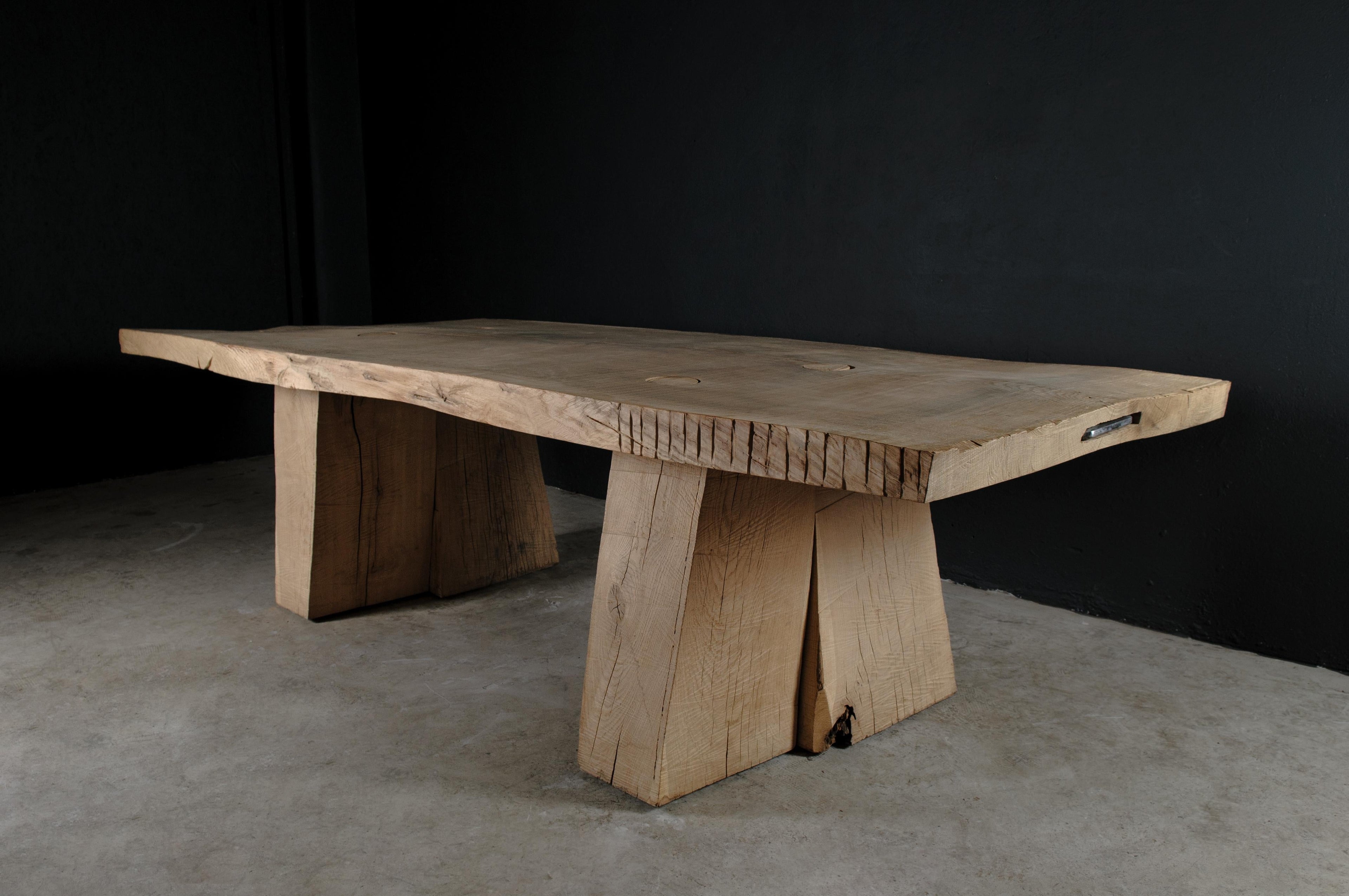 https://a.1stdibscdn.com/sculpted-massive-dining-table-v8-in-solid-oakwood-custom-size-for-sale-picture-11/f_31233/f_298323621659452605131/DSC_0010_master.jpg