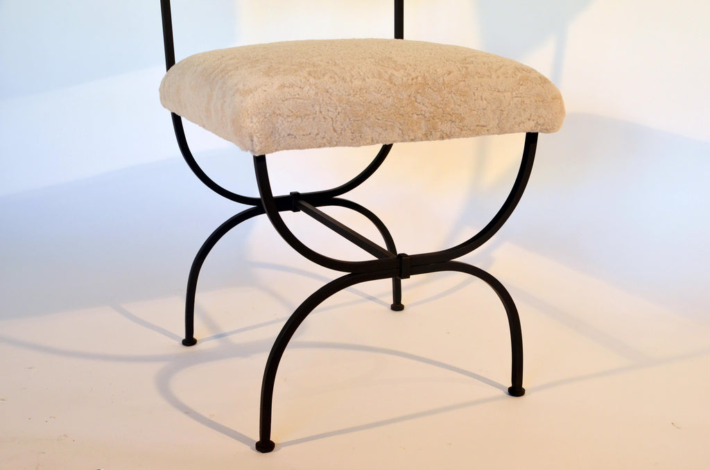 https://a.1stdibscdn.com/pair-of-chic-arcade-wrought-iron-and-shearling-chairs-by-design-freres-for-sale-picture-9/f_8184/f_222186221611307556029/DSC_0012_master.JPG