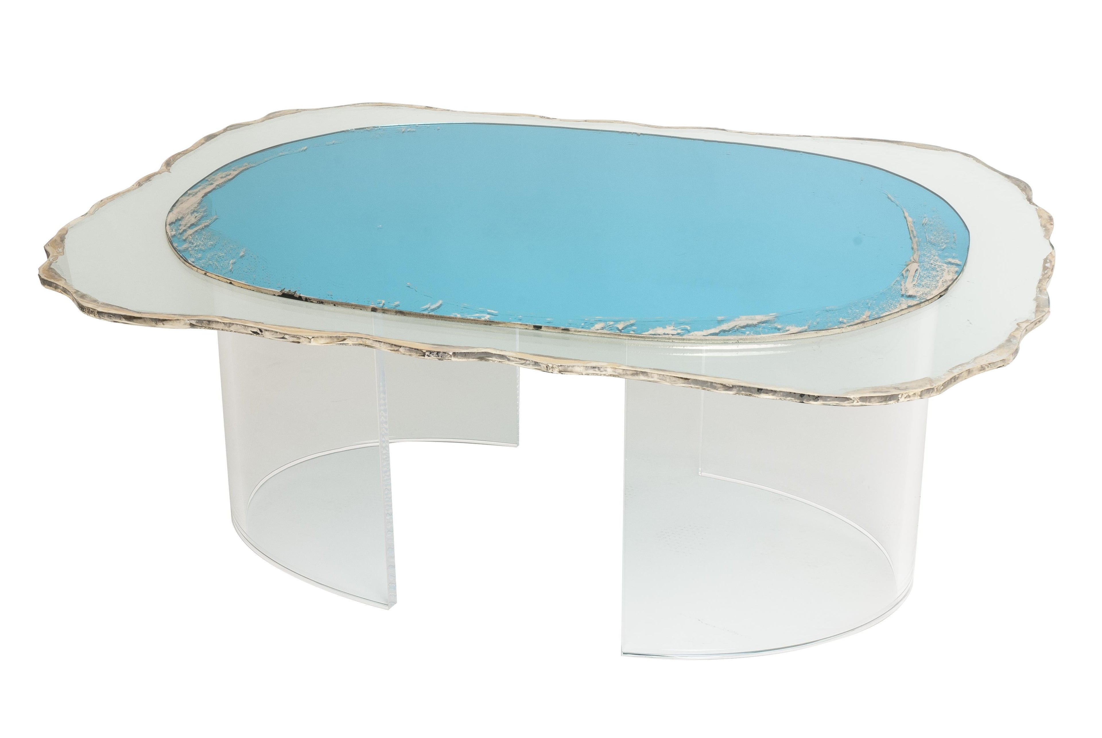 https://a.1stdibscdn.com/contemporary-coffee-table-silvered-art-glass-surface-and-transparent-legs-for-sale-picture-9/f_16022/f_144241411556364693476/DSC_0080_master.jpg