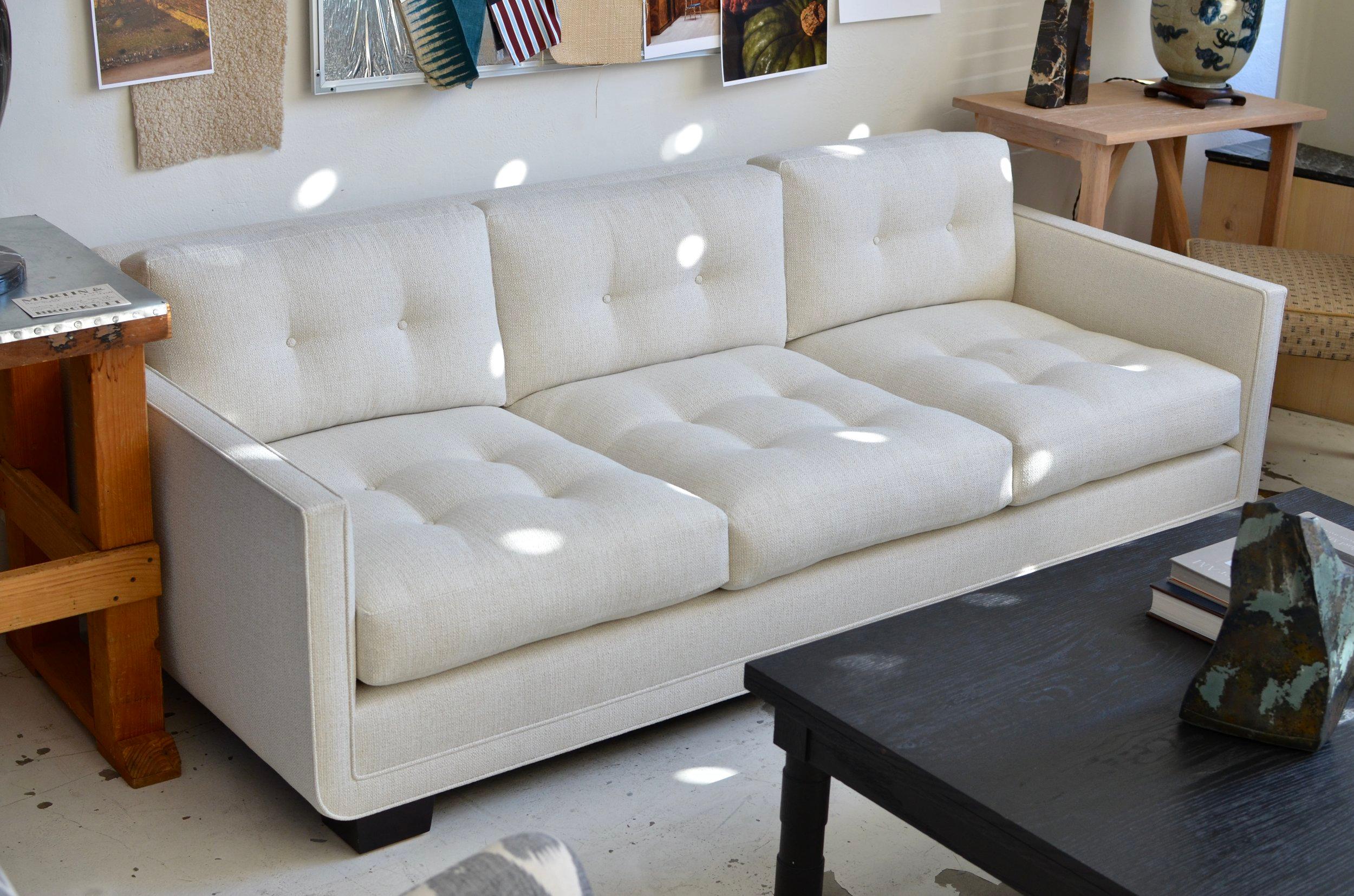 https://a.1stdibscdn.com/modern-streamline-tufted-sofa-with-curved-frame-detail-by-martin-brockett-for-sale-picture-3/f_50711/f_373666921701473611337/DSC_0091_Copy_2__master.jpg