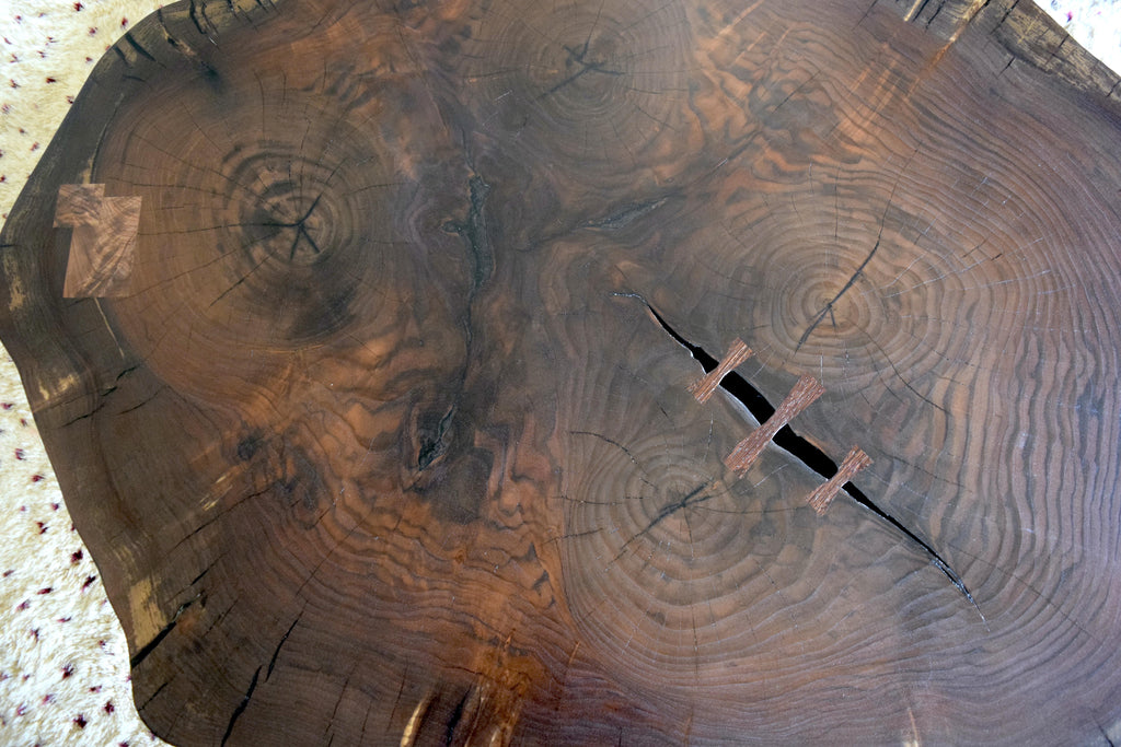 https://a.1stdibscdn.com/modern-cookie-slab-coffee-table-with-large-turned-legs-and-wenge-butterflies-for-sale-picture-3/f_36023/f_468315321758912025087/DSC_0608_master.JPG