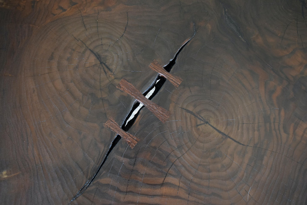 https://a.1stdibscdn.com/modern-cookie-slab-coffee-table-with-large-turned-legs-and-wenge-butterflies-for-sale-picture-4/f_36023/f_468315321758912026558/DSC_0609_master.JPG