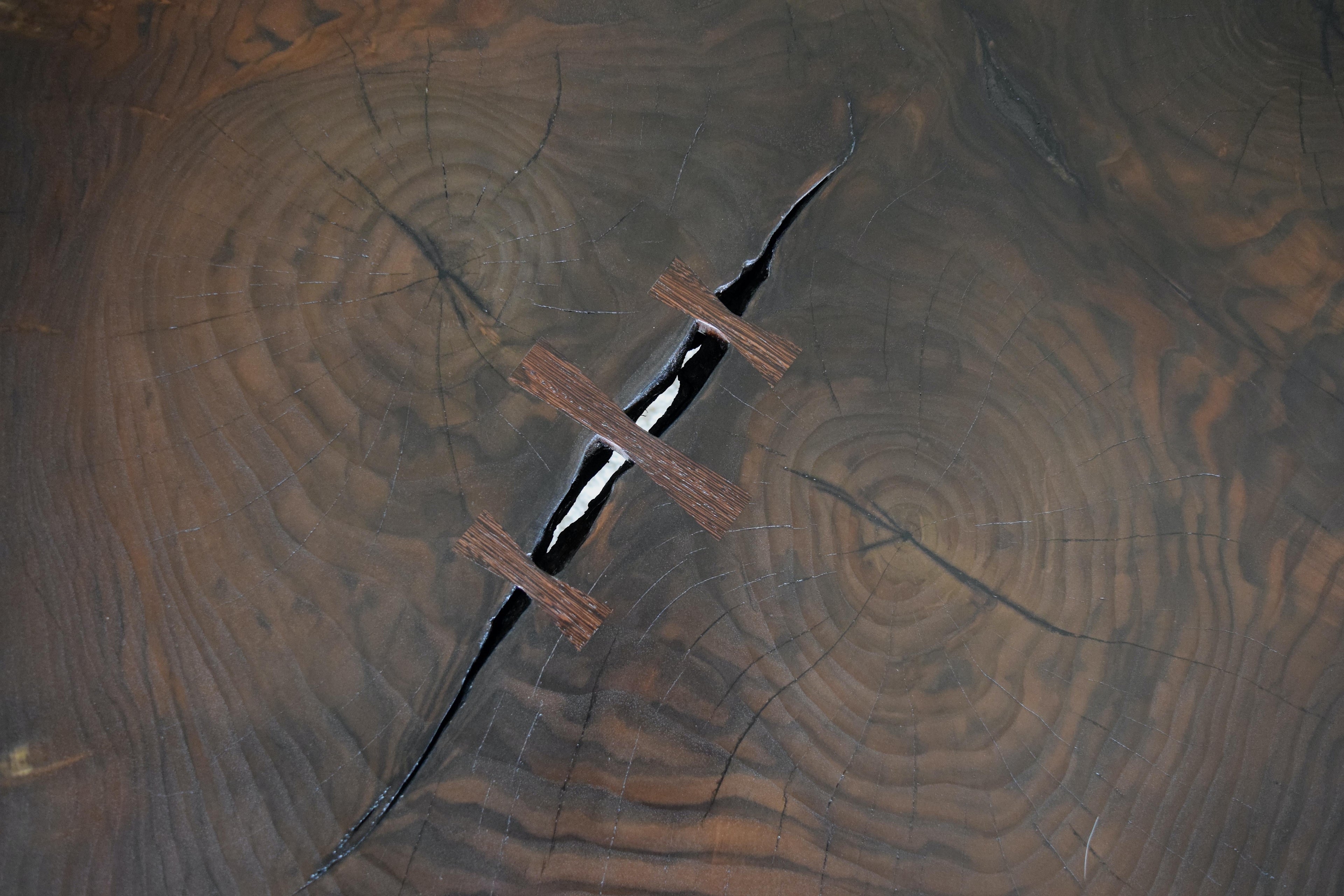 https://a.1stdibscdn.com/modern-cookie-slab-coffee-table-with-large-turned-legs-and-wenge-butterflies-for-sale-picture-4/f_36023/f_468315321758912026558/DSC_0609_master.JPG