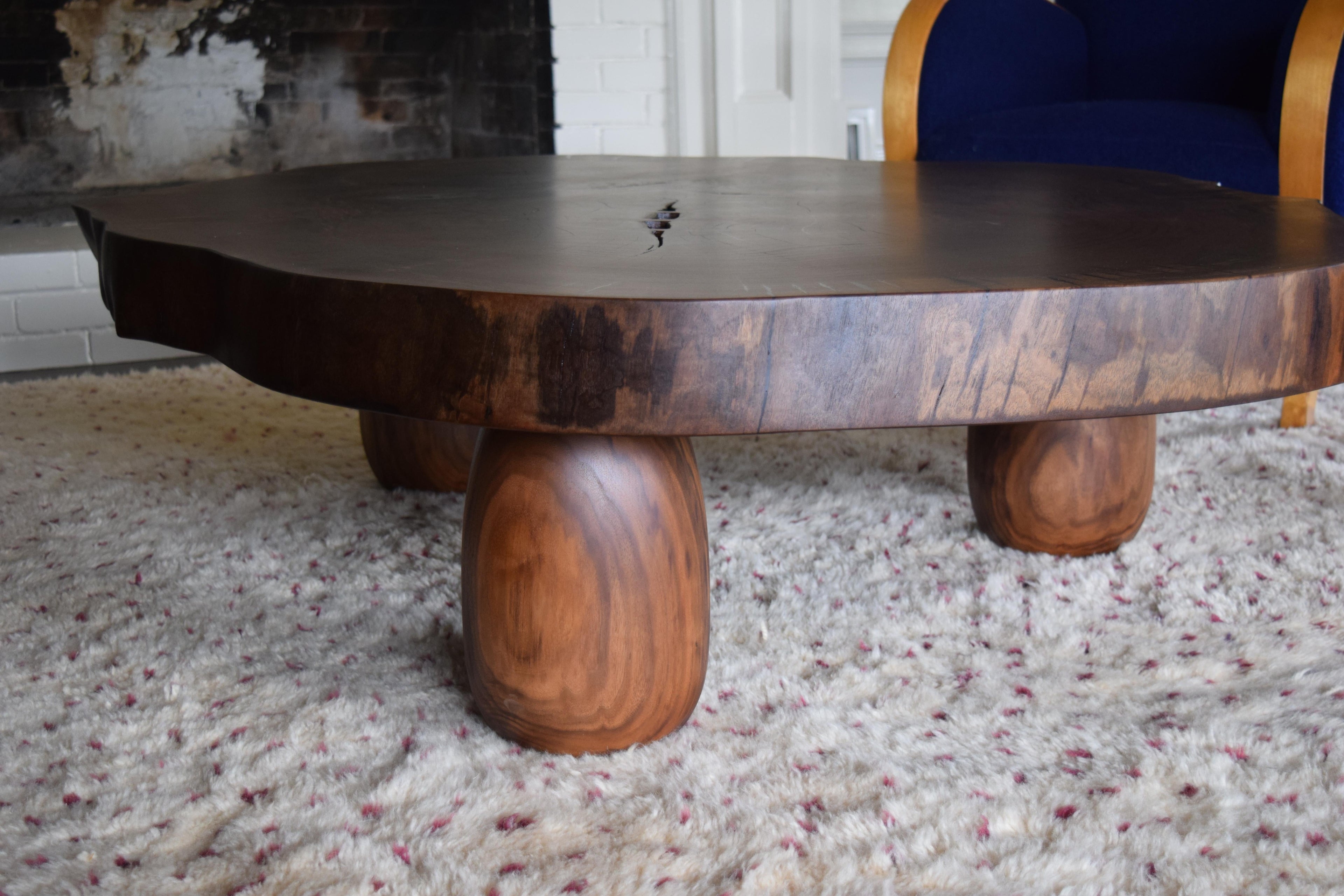 https://a.1stdibscdn.com/modern-cookie-slab-coffee-table-with-large-turned-legs-and-wenge-butterflies-for-sale-picture-6/f_36023/f_468315321758912028694/DSC_0619_master.JPG