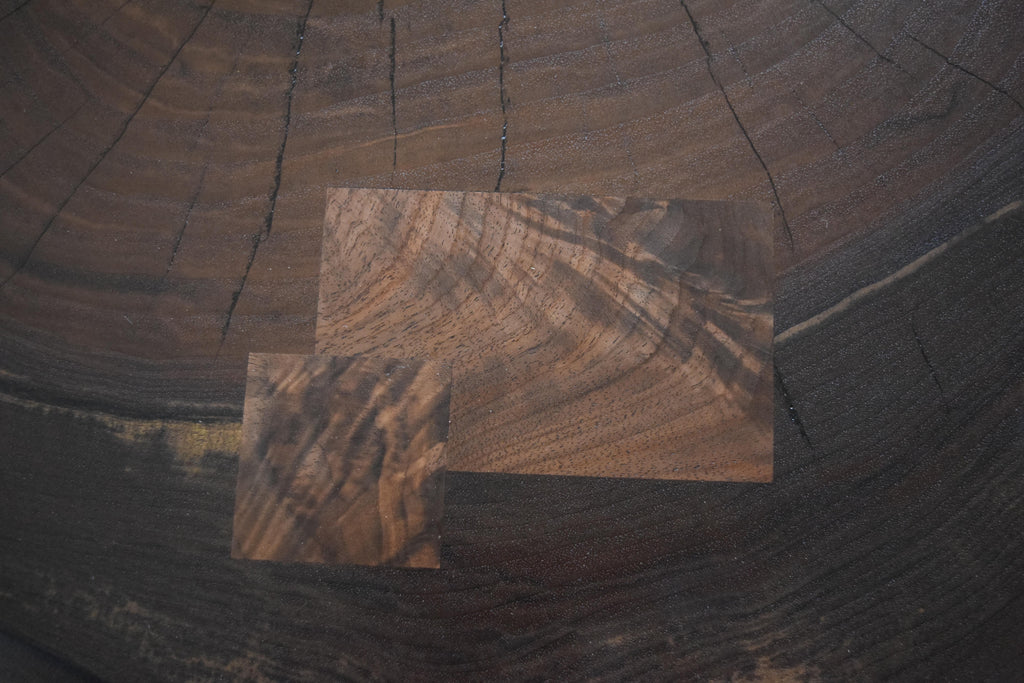 https://a.1stdibscdn.com/modern-cookie-slab-coffee-table-with-large-turned-legs-and-wenge-butterflies-for-sale-picture-7/f_36023/f_468315321758912029624/DSC_0622_master.JPG