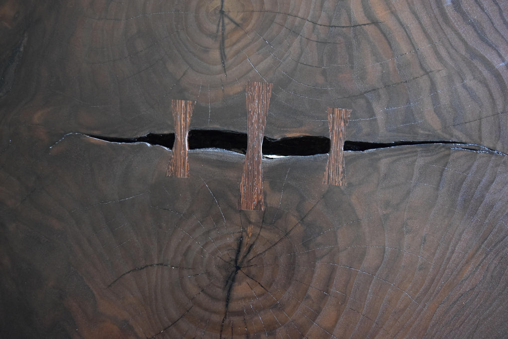 https://a.1stdibscdn.com/modern-cookie-slab-coffee-table-with-large-turned-legs-and-wenge-butterflies-for-sale-picture-8/f_36023/f_468315321758912031001/DSC_0623_master.JPG