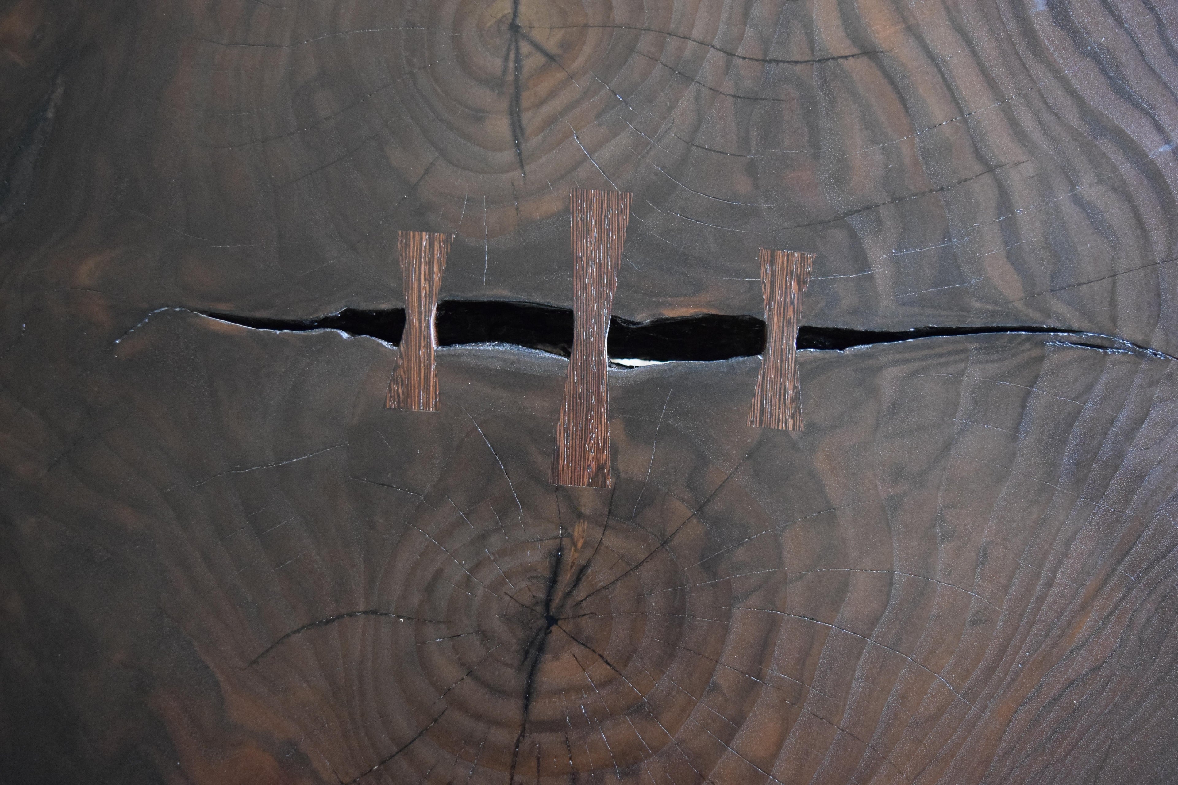 https://a.1stdibscdn.com/modern-cookie-slab-coffee-table-with-large-turned-legs-and-wenge-butterflies-for-sale-picture-8/f_36023/f_468315321758912031001/DSC_0623_master.JPG