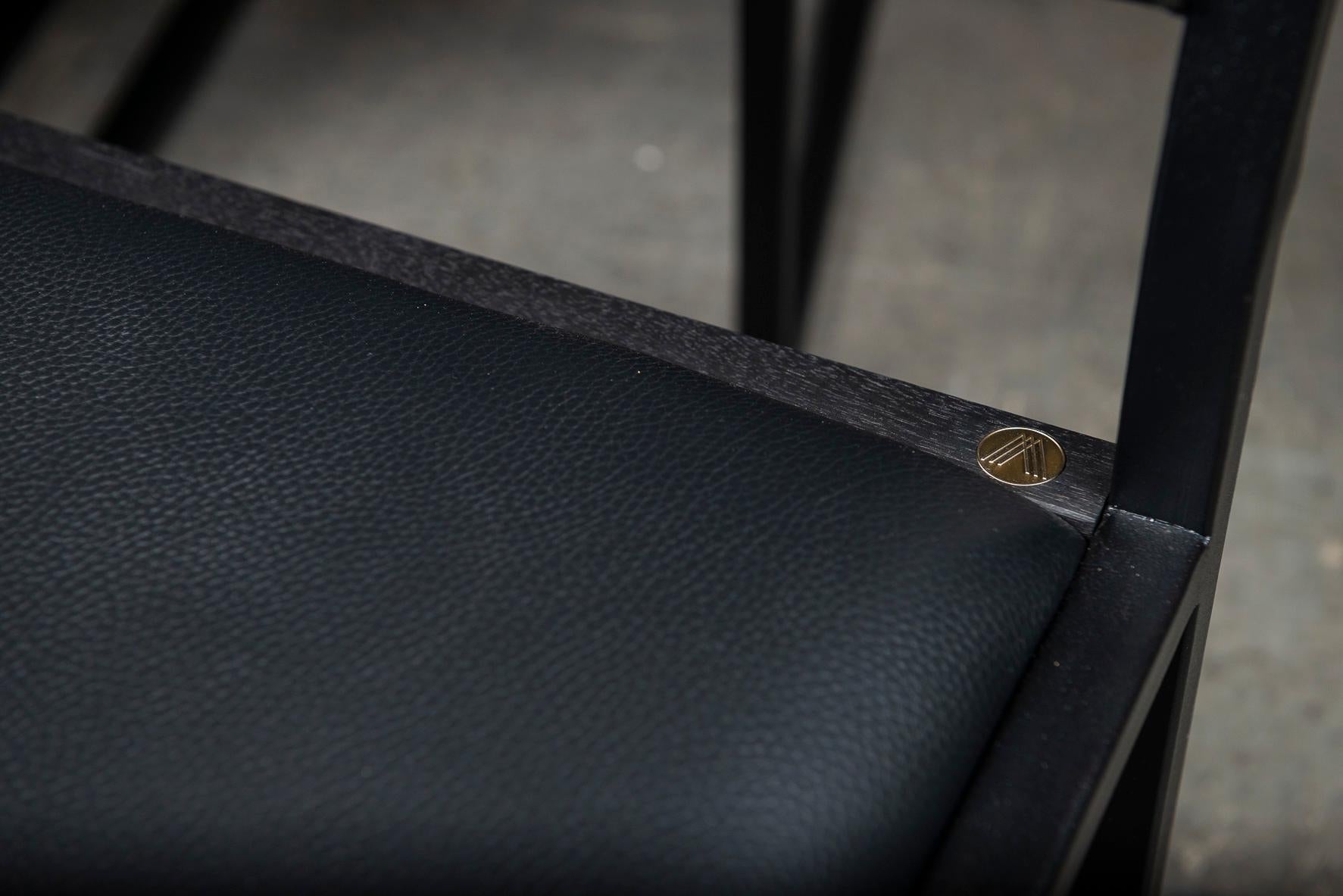 https://a.1stdibscdn.com/shaker-modern-chair-by-ambrozia-salt-pepper-cow-hide-black-leather-steel-for-sale-picture-4/f_36881/f_177801121580485962541/DSC_1811_master.jpg