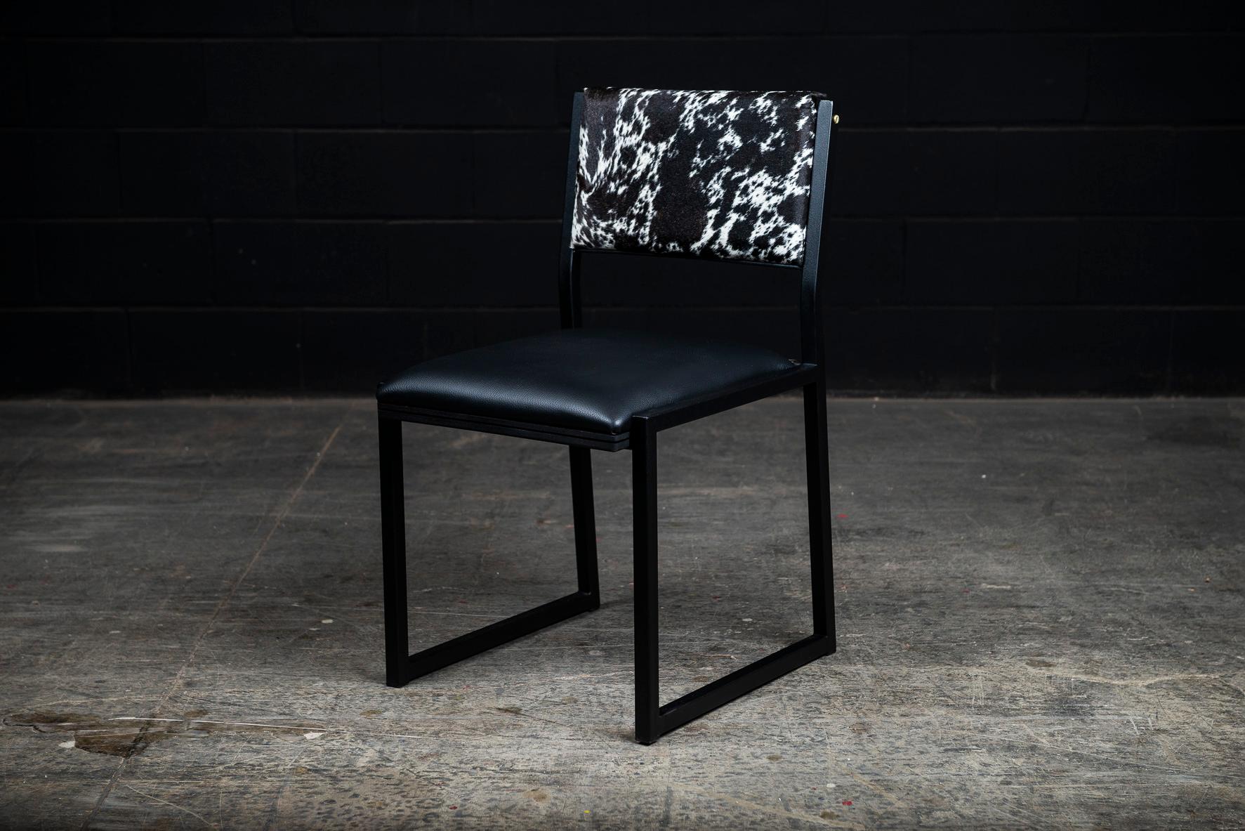 https://a.1stdibscdn.com/shaker-modern-chair-by-ambrozia-salt-pepper-cow-hide-black-leather-steel-for-sale-picture-3/f_36881/f_177801121580485963590/DSC_1825_master.jpg