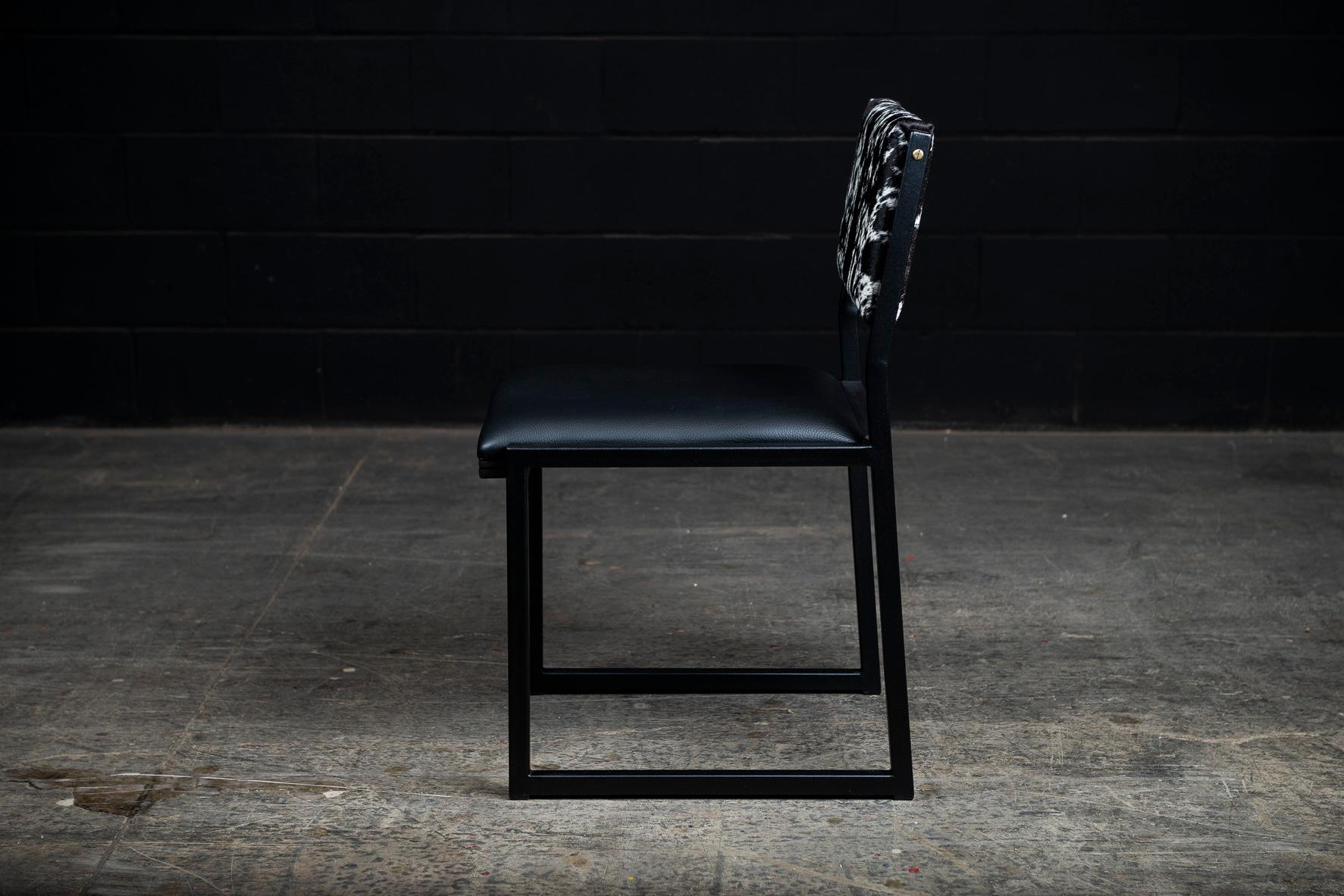 https://a.1stdibscdn.com/shaker-modern-chair-by-ambrozia-salt-pepper-cow-hide-black-leather-steel-for-sale-picture-5/f_36881/f_177801121580485964548/DSC_1826_master.jpg