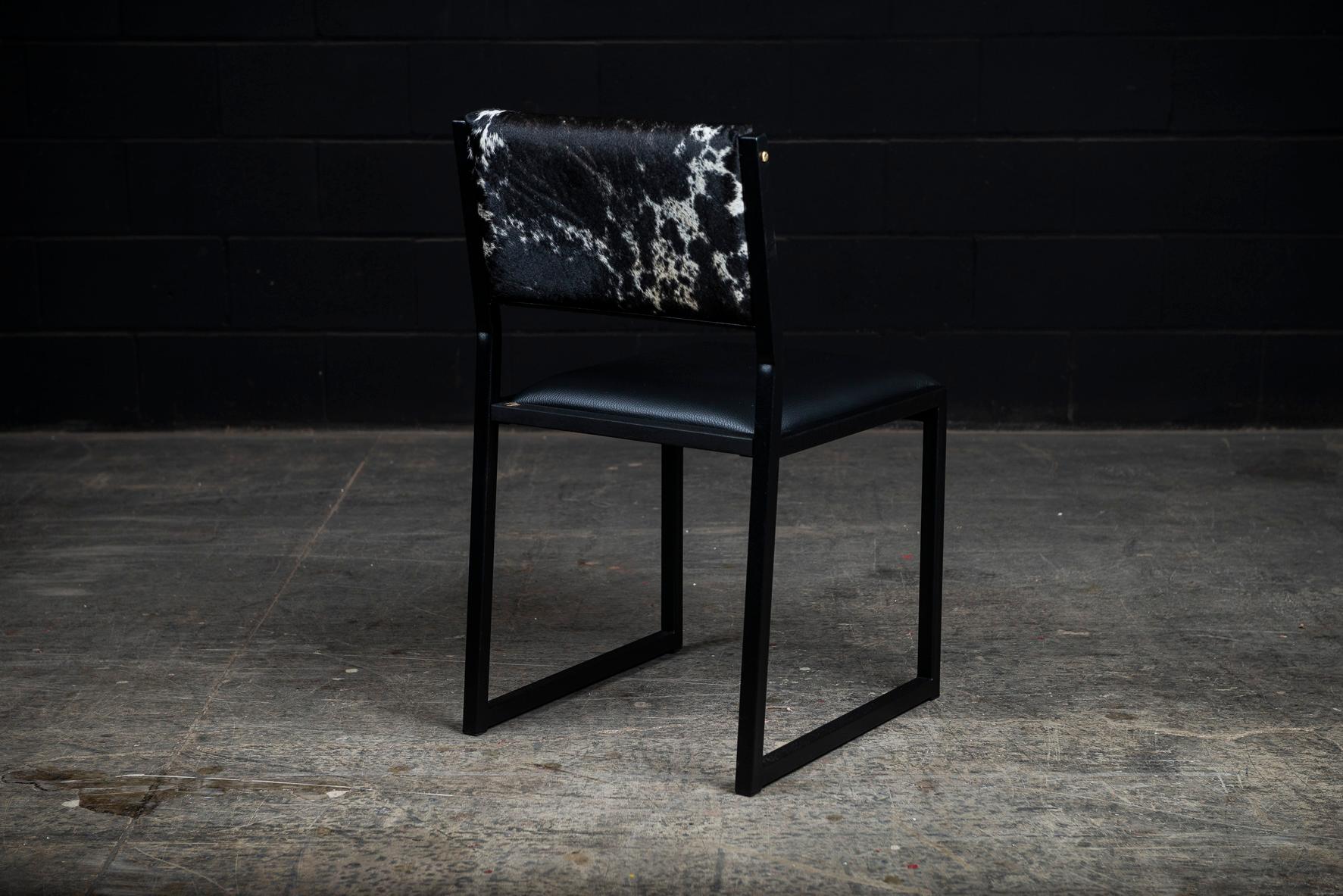 https://a.1stdibscdn.com/shaker-modern-chair-by-ambrozia-salt-pepper-cow-hide-black-leather-steel-for-sale-picture-6/f_36881/f_177801121580485965652/DSC_1830_master.jpg