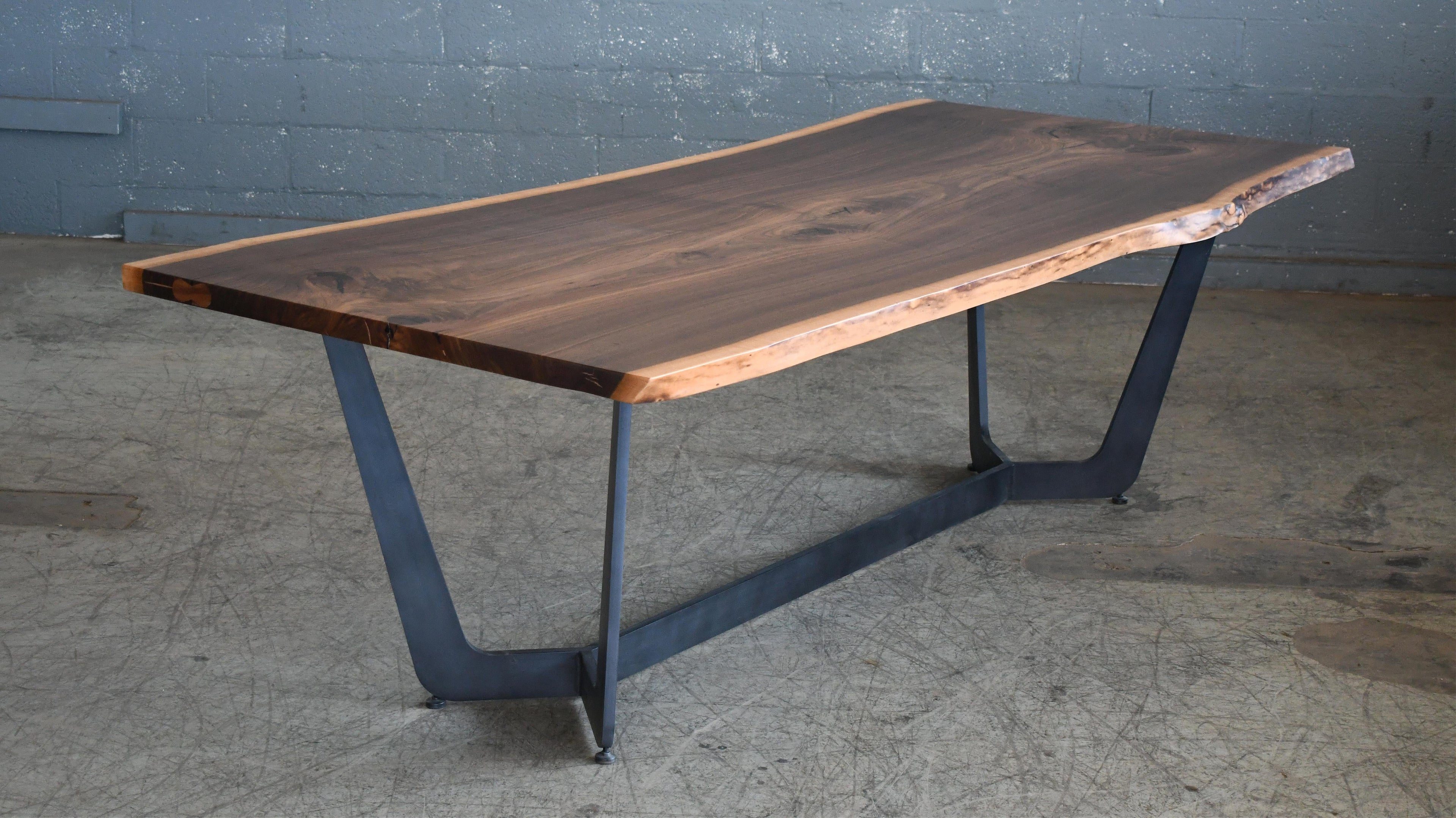https://a.1stdibscdn.com/very-large-custom-made-10-seat-live-edge-dining-table-in-american-black-walnut-for-sale-picture-2/f_23733/f_415445221728059369771/DSC_2093_1__master.jpg