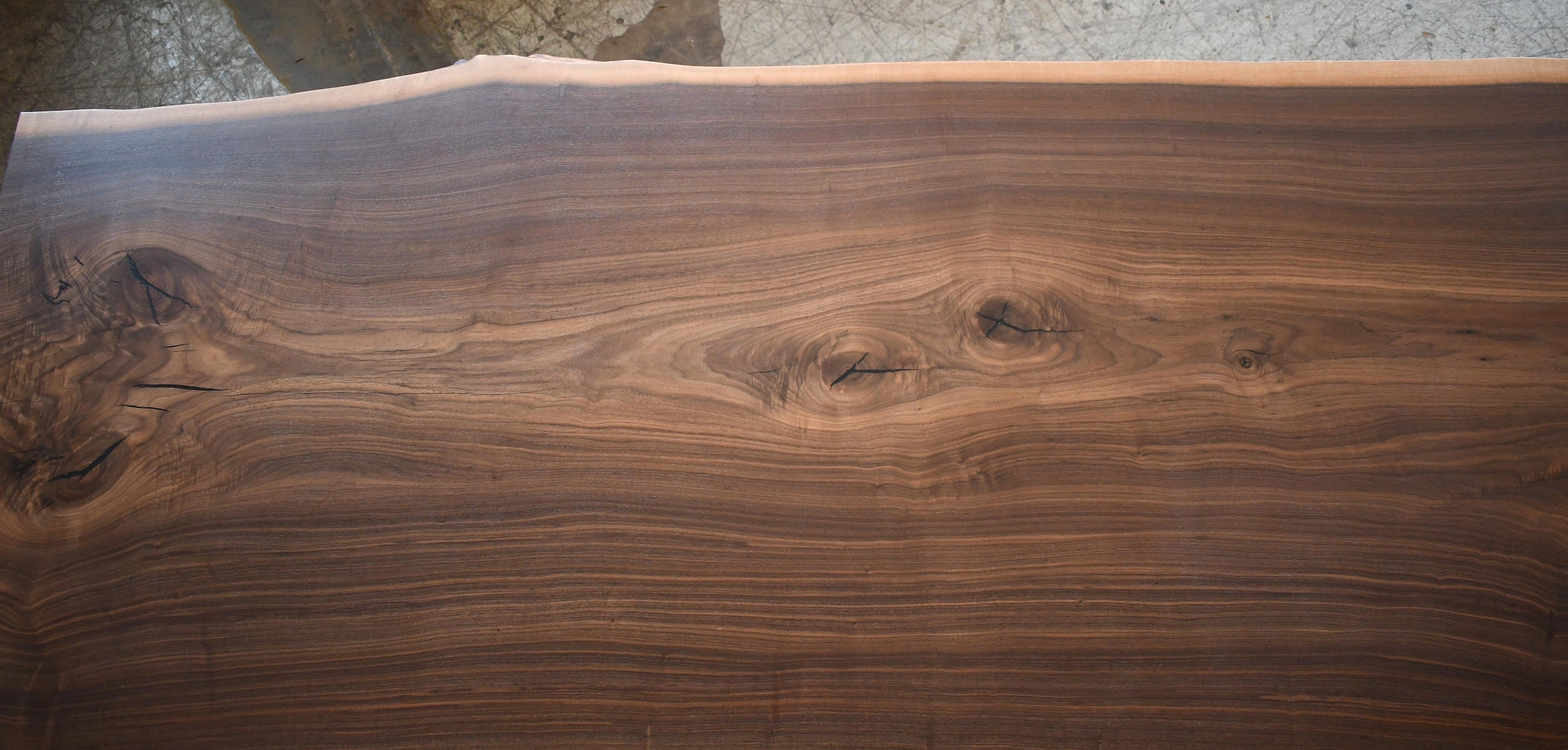 https://a.1stdibscdn.com/very-large-custom-made-10-seat-live-edge-dining-table-in-american-black-walnut-for-sale-picture-5/f_23733/f_415445221728059367827/DSC_2101_1__master.jpg