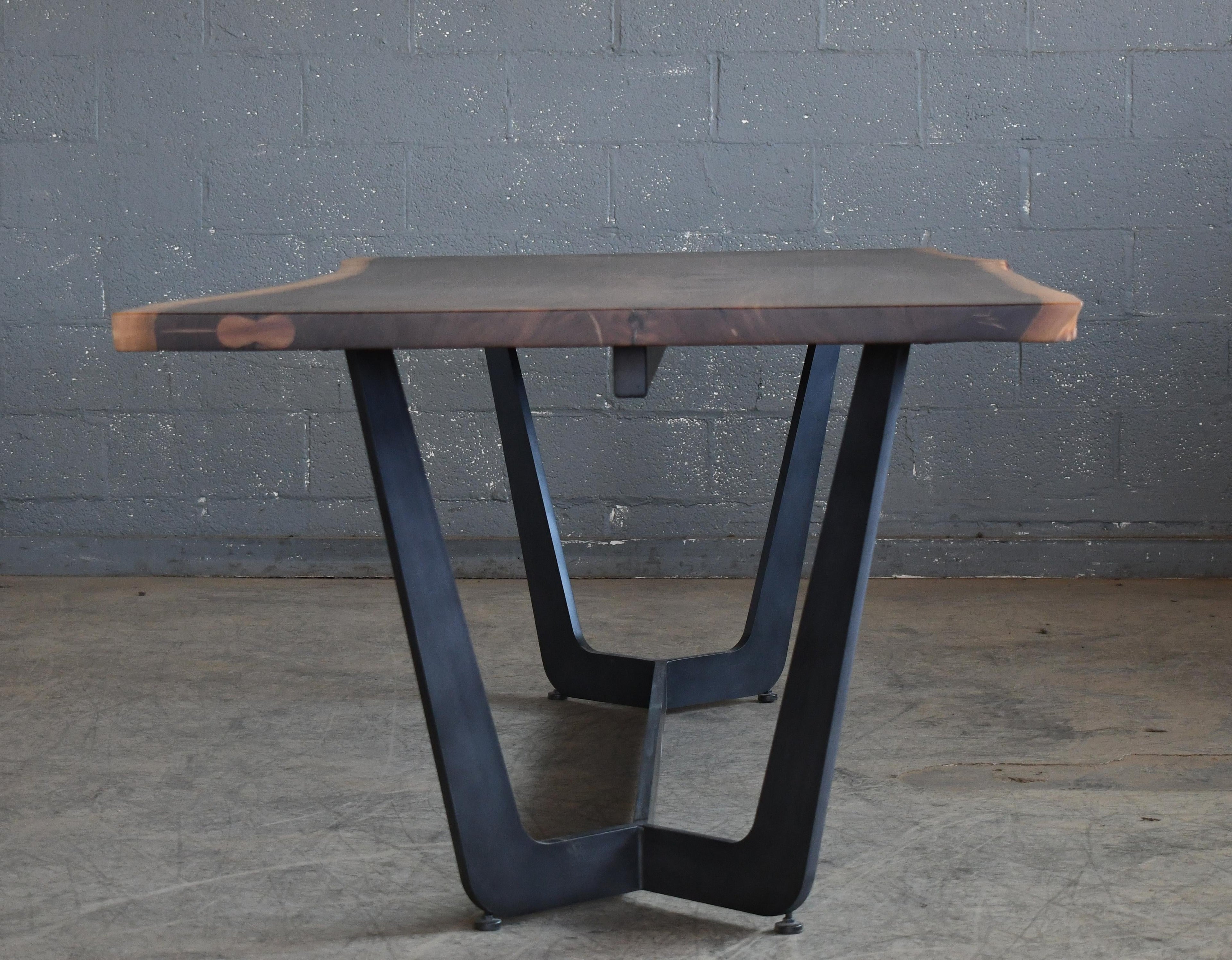 https://a.1stdibscdn.com/very-large-custom-made-10-seat-live-edge-dining-table-in-american-black-walnut-for-sale-picture-4/f_23733/f_415445221728059365864/DSC_2105_master.jpg