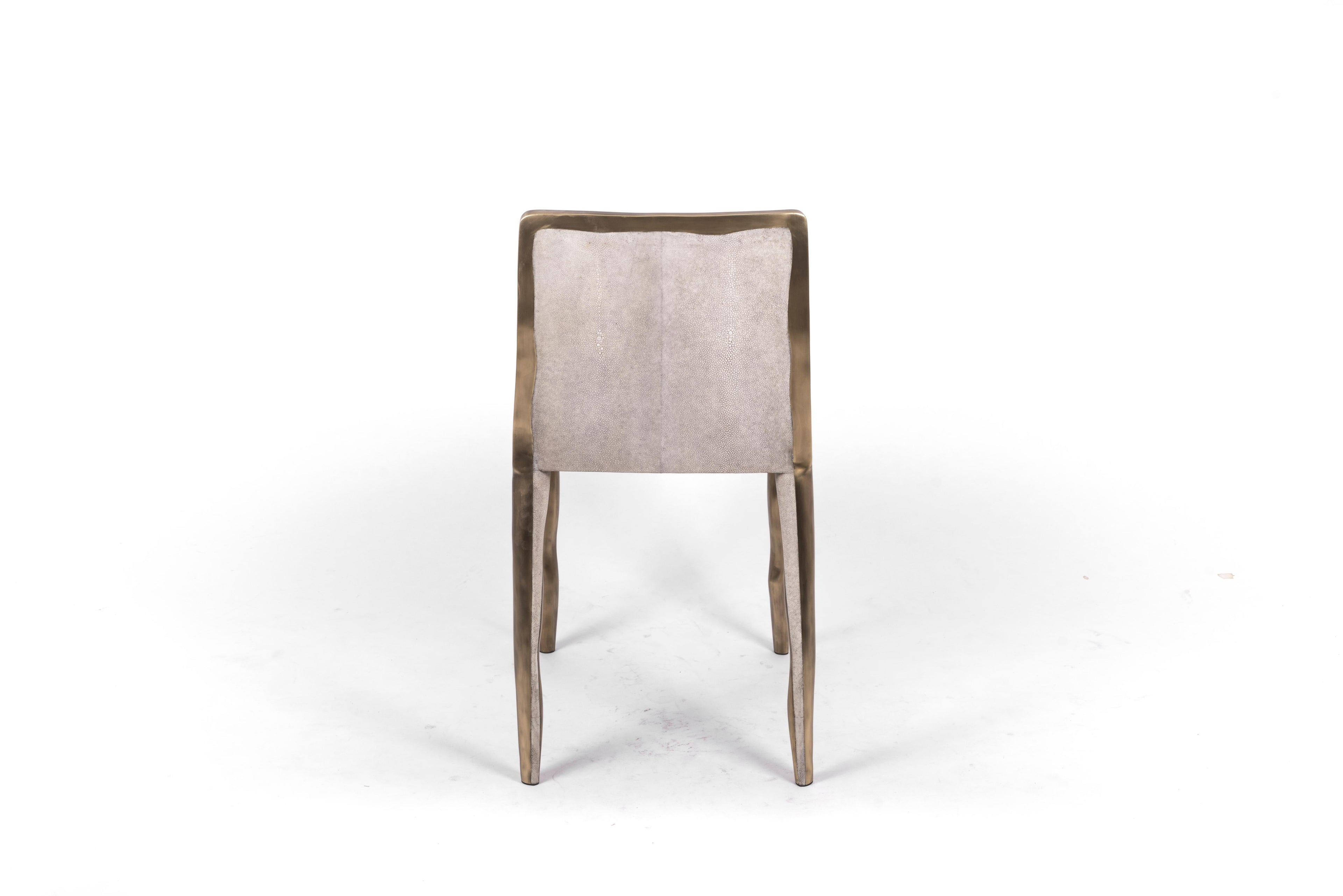 https://a.1stdibscdn.com/melting-chair-in-blue-shagreen-and-bronze-patina-brass-by-ry-augousti-for-sale-picture-8/f_45491/f_163723221570372455515/DSC_5234_master.jpg